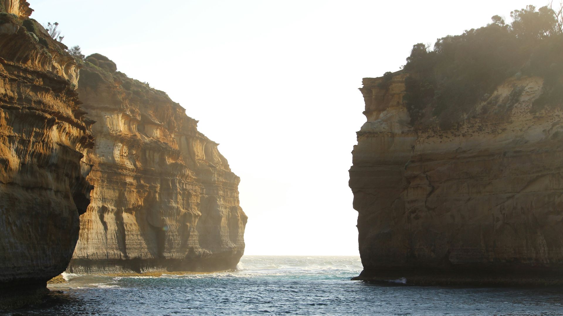 two large rocks sticking out of the ocean