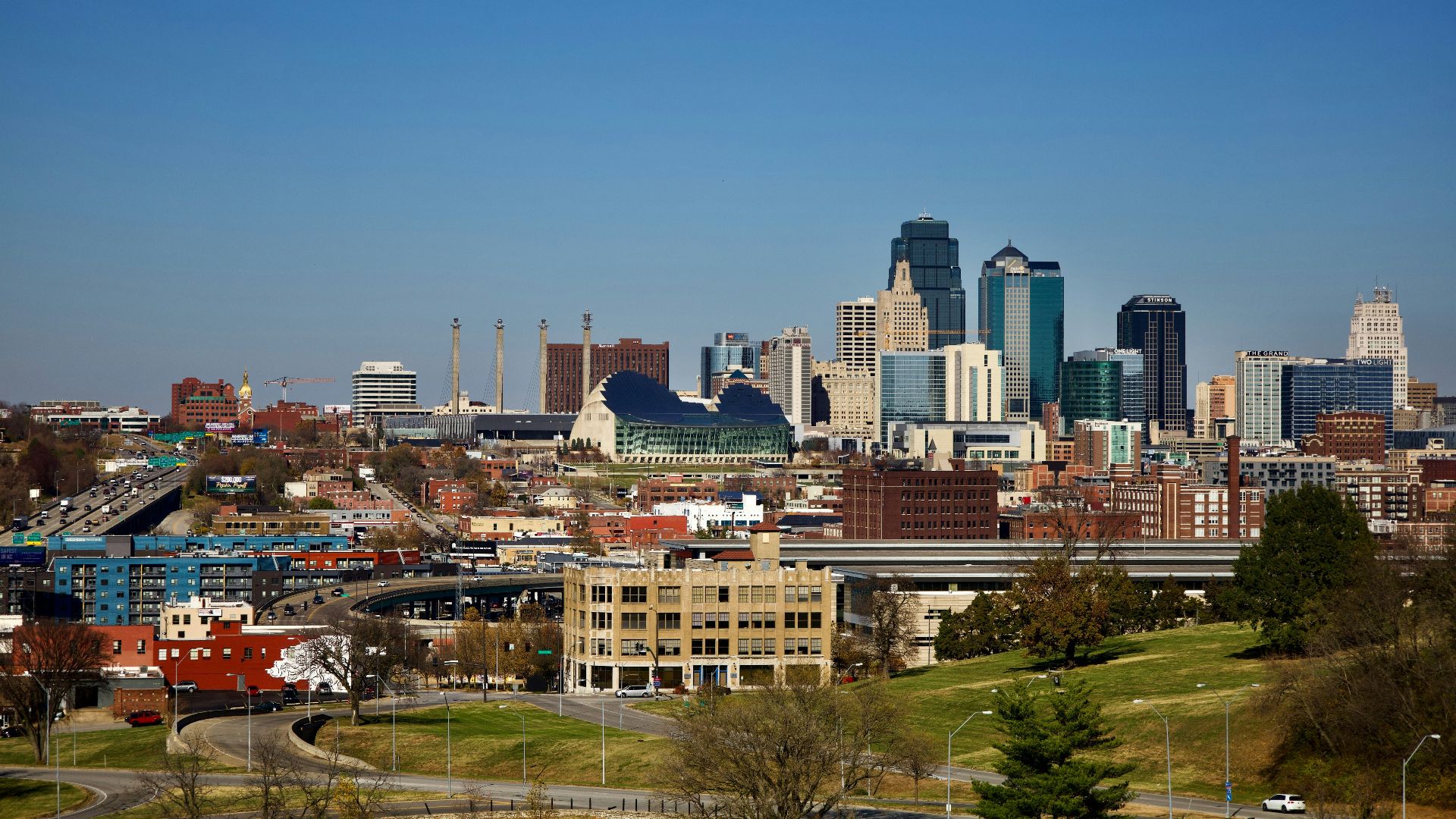 city buildings under blue sky during daytime