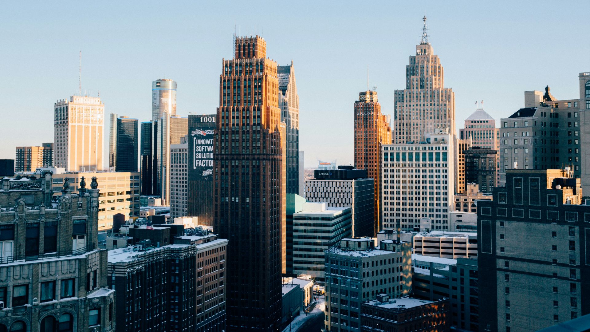 a view of a city with tall buildings