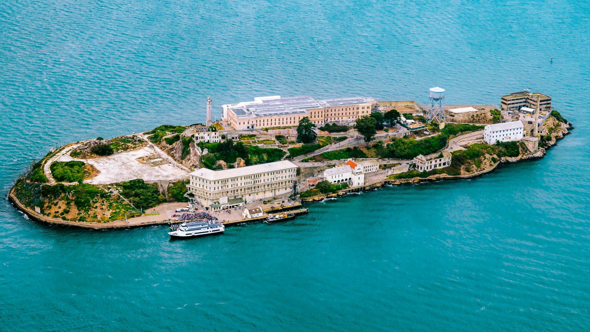top view photography of island surrounded by body of water