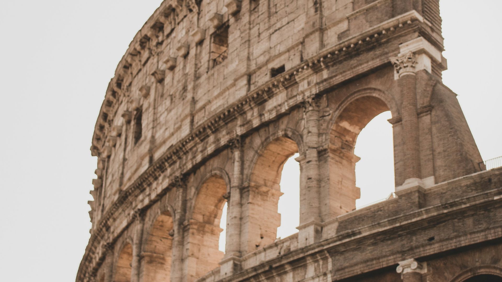 brown concrete building under white sky during daytime