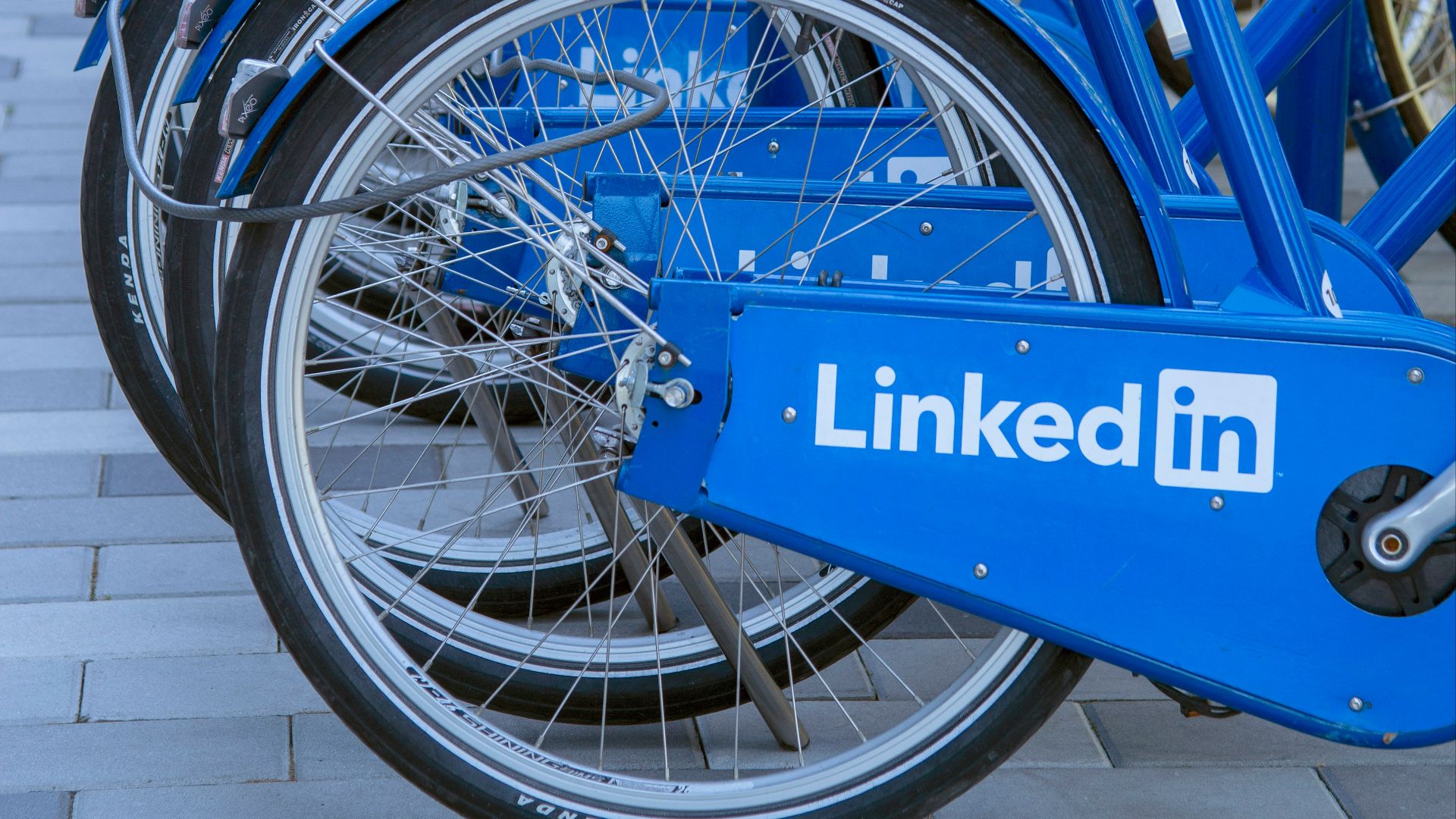 blue bicycle on gray concrete floor