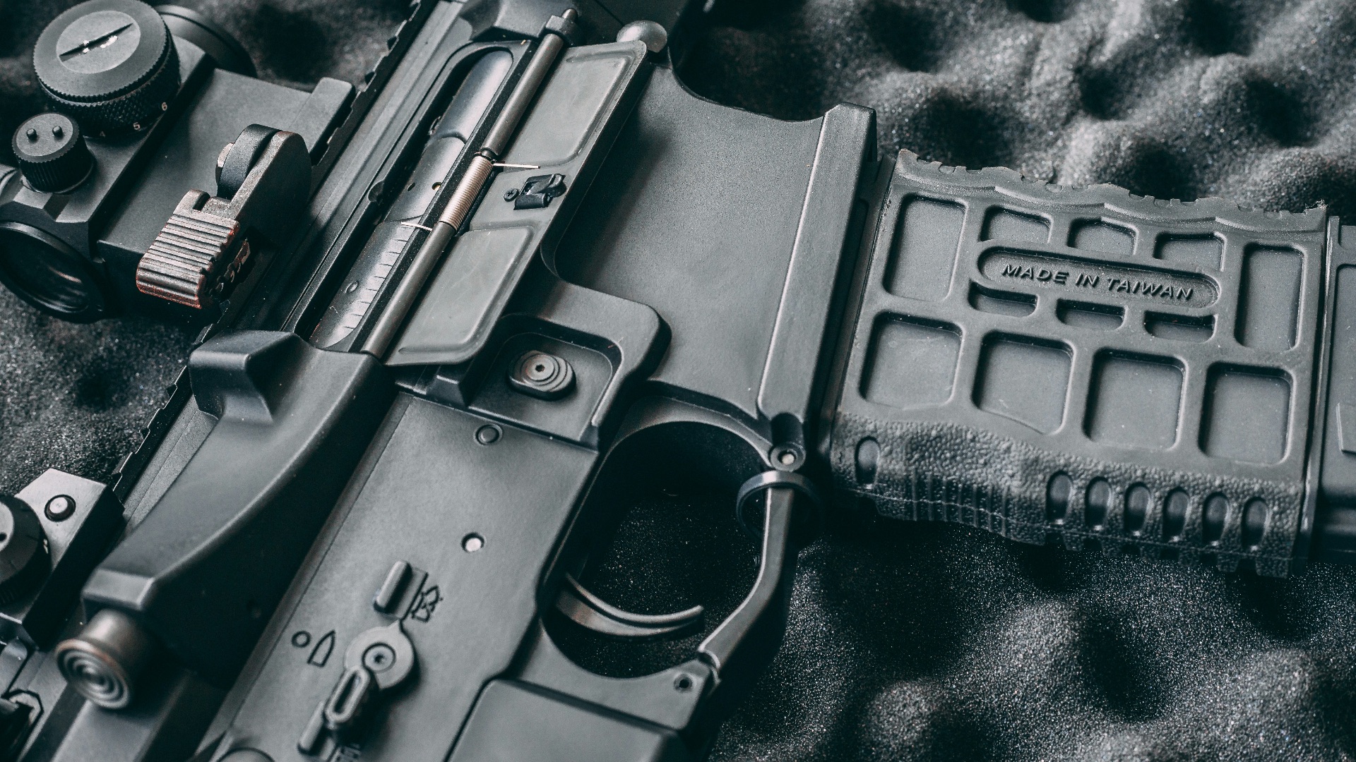 black semi automatic pistol with black case