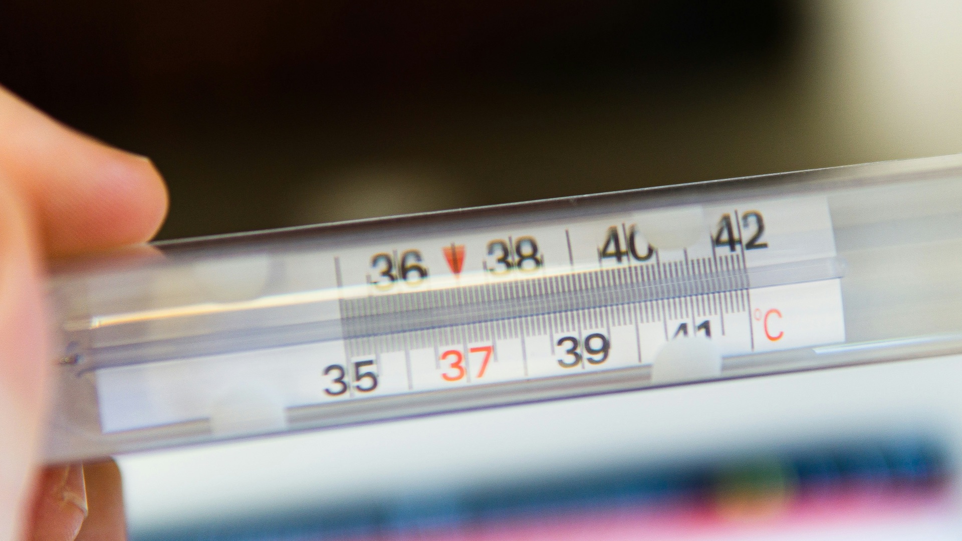 white thermometer at 36 degrees celsius