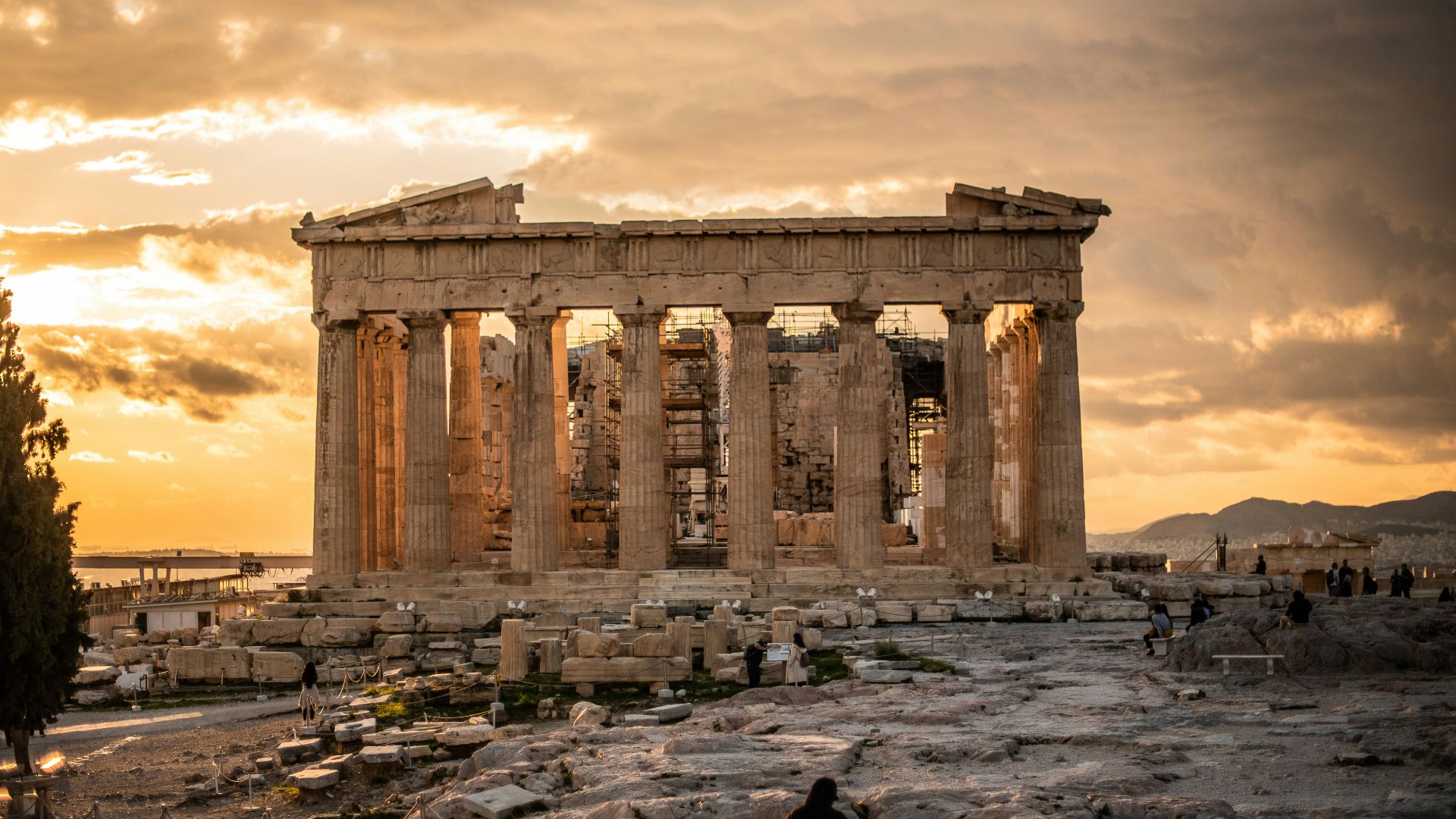 people walking near brown concrete building during daytime