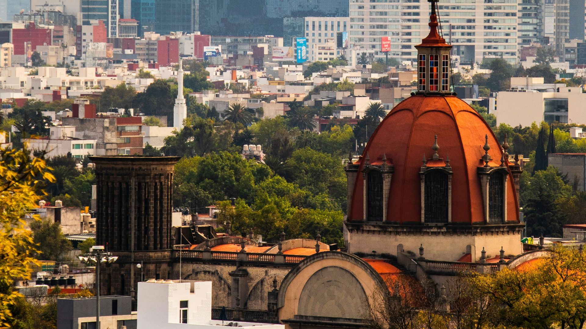 a view of a city with tall buildings
