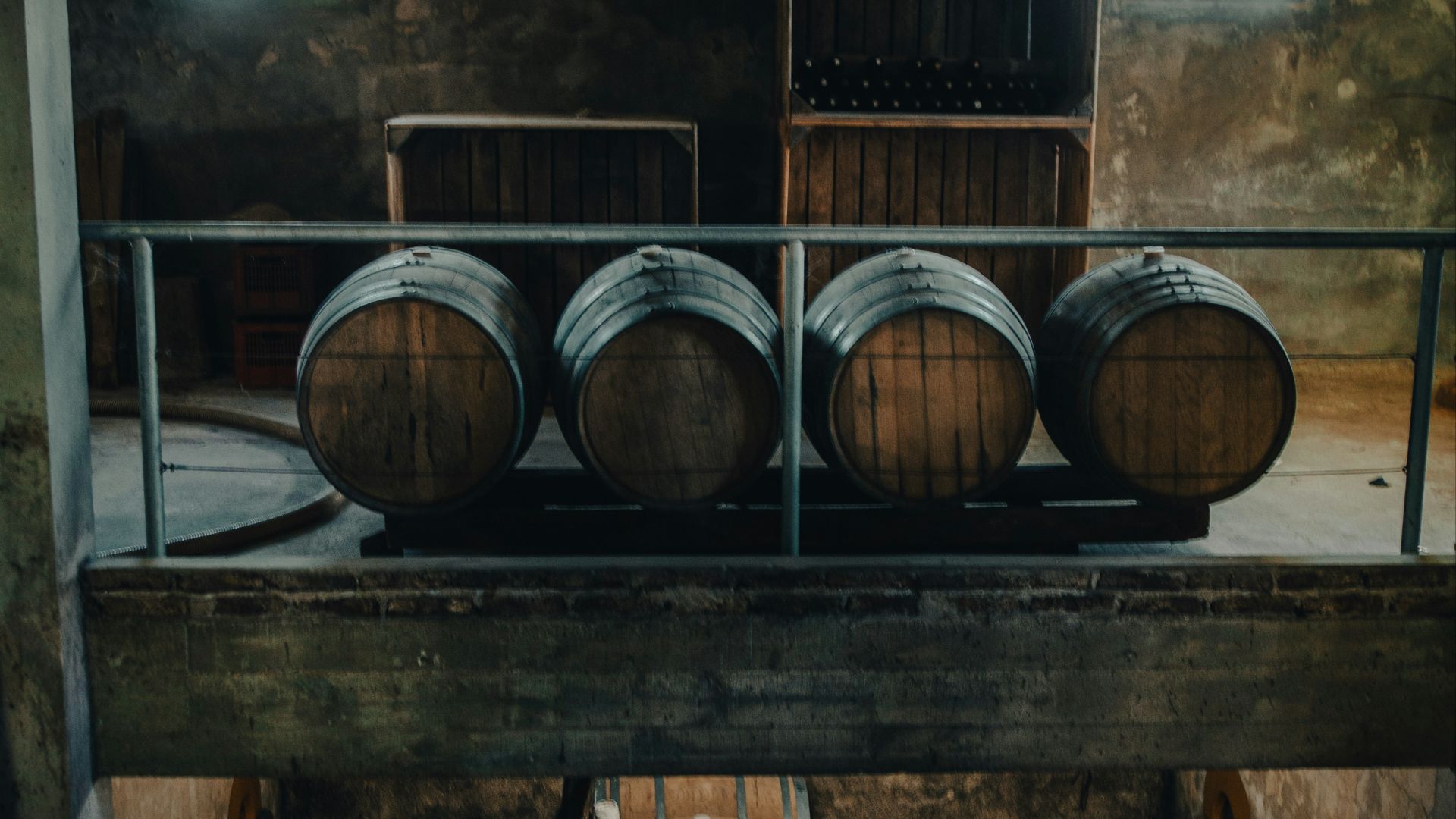 a bunch of barrels that are sitting in a room