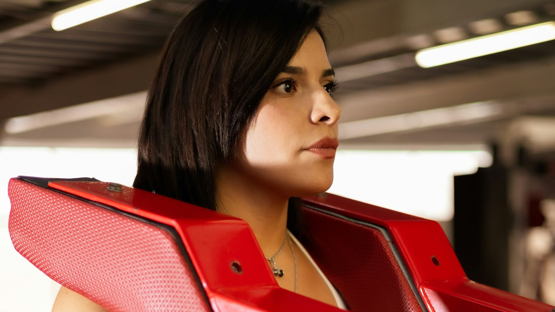 Woman is working out in a gym.