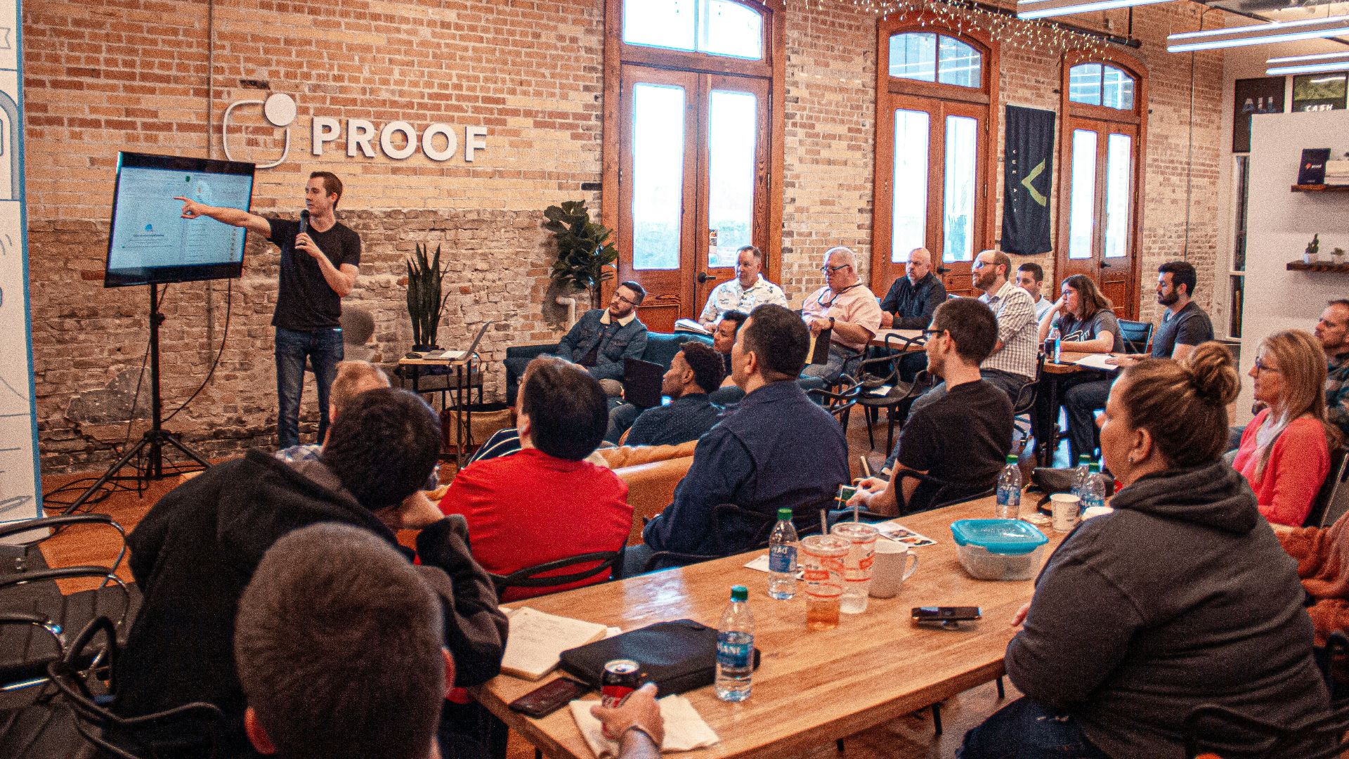 people sitting on chair in front of table