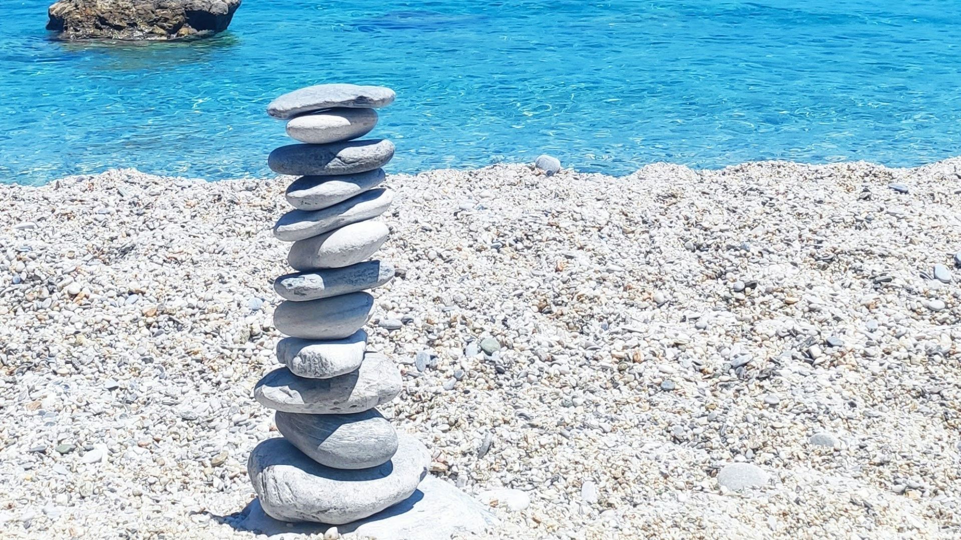 a stack of rocks on a beach
