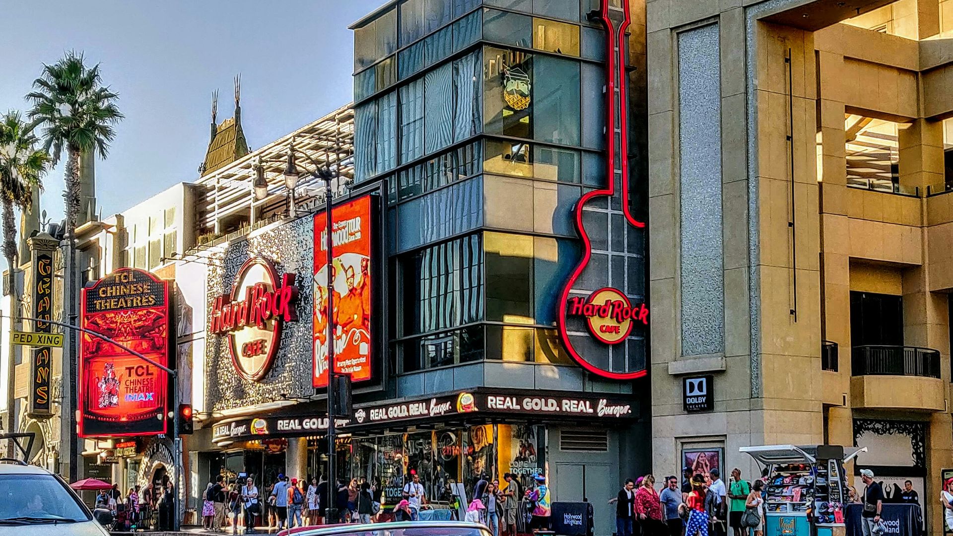 red convertible car on road during daytime