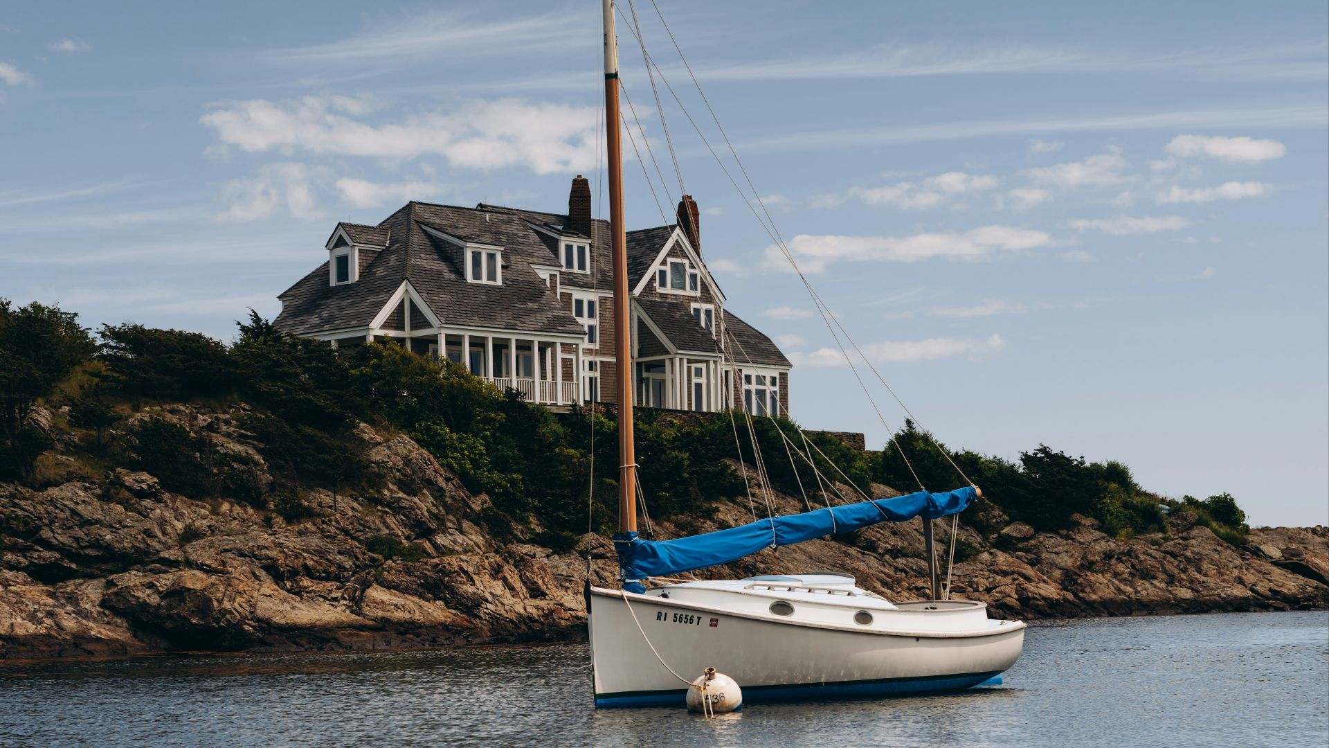 white boat on body of water during daytime