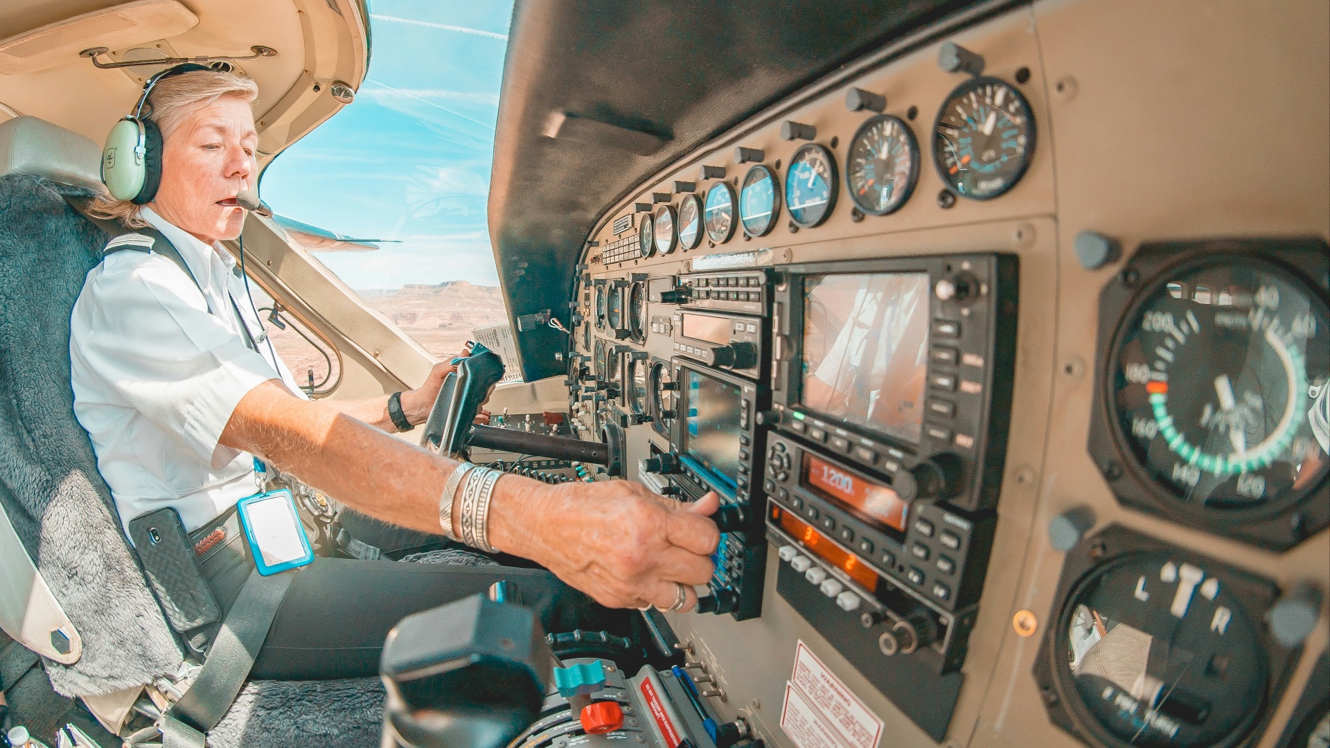 person in black jacket driving car during daytime