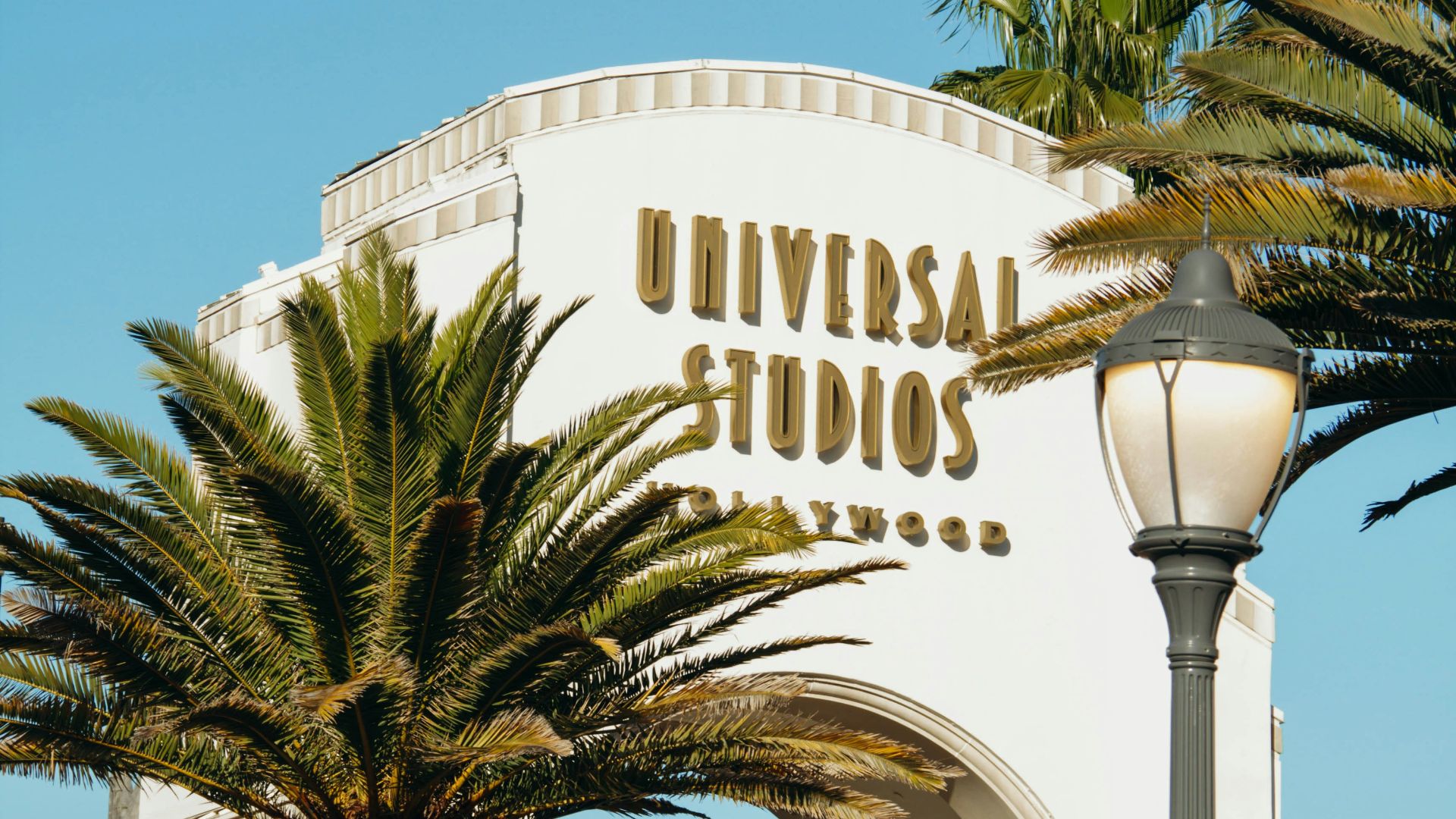 a large white building with a sign on it