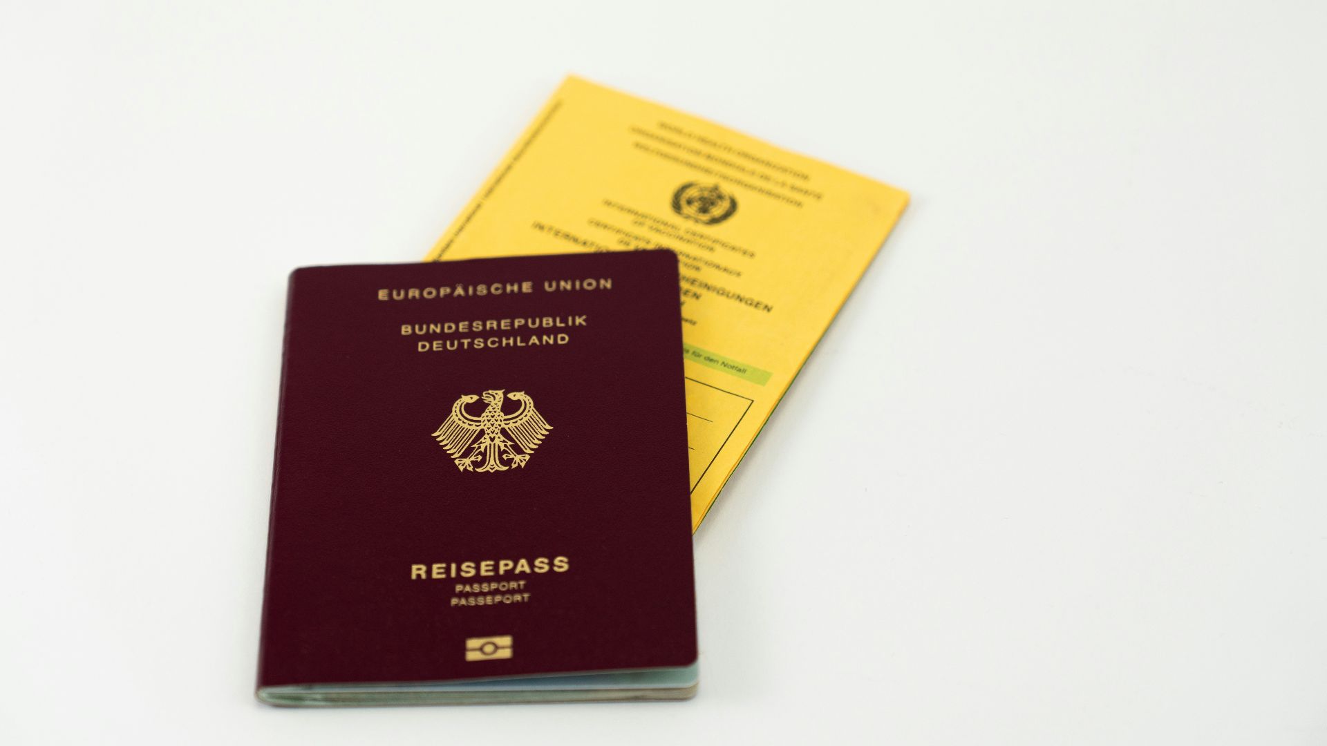 red and yellow book on white table