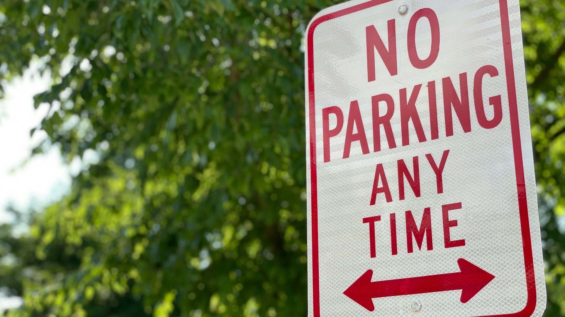 red and white no smoking sign