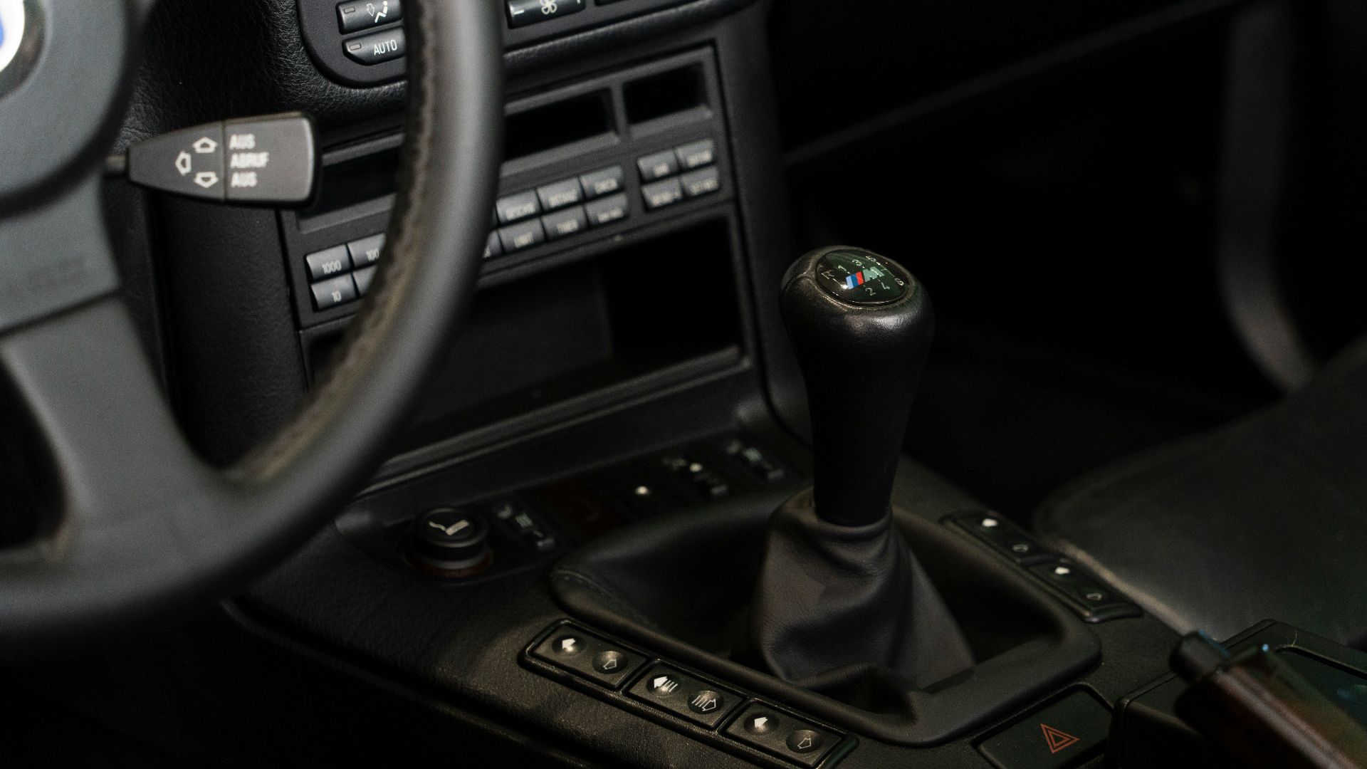 a steering wheel and dashboard of a car