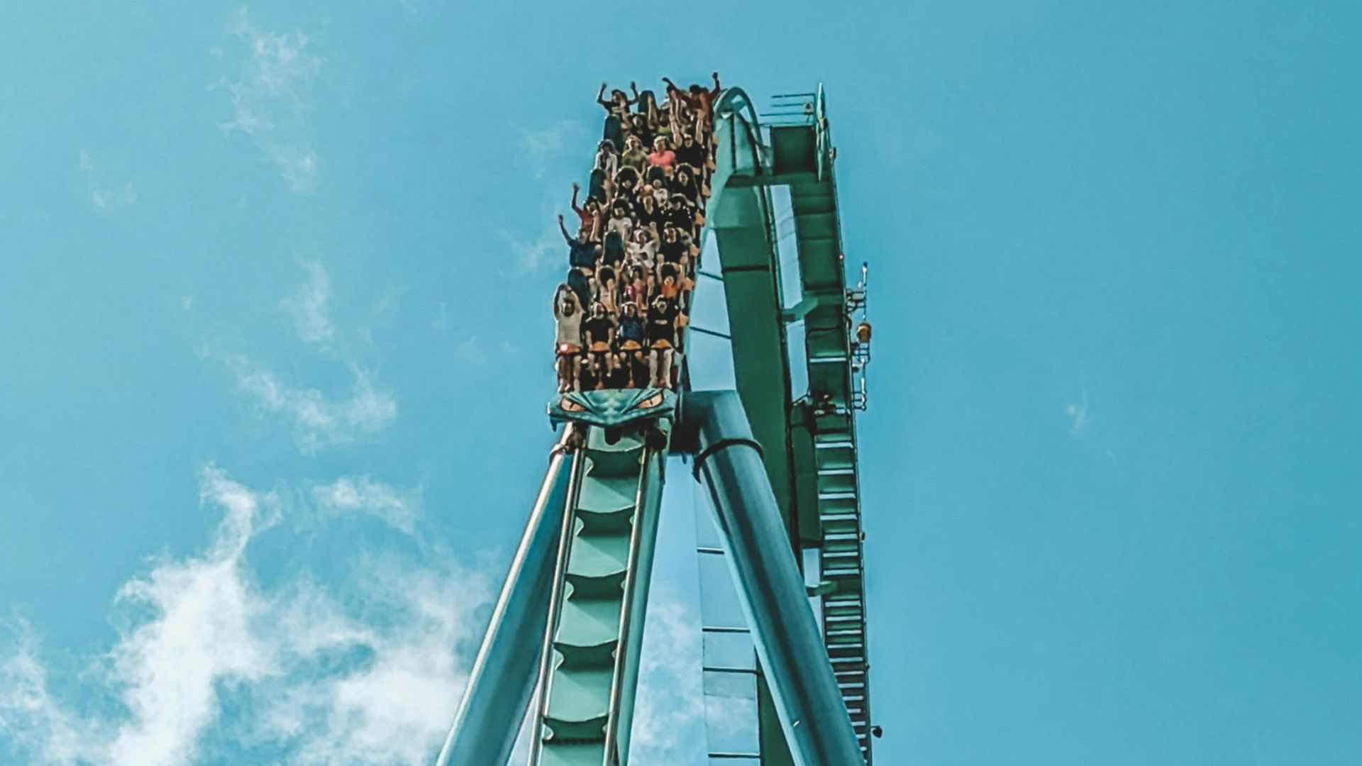 a roller coaster going up in the air