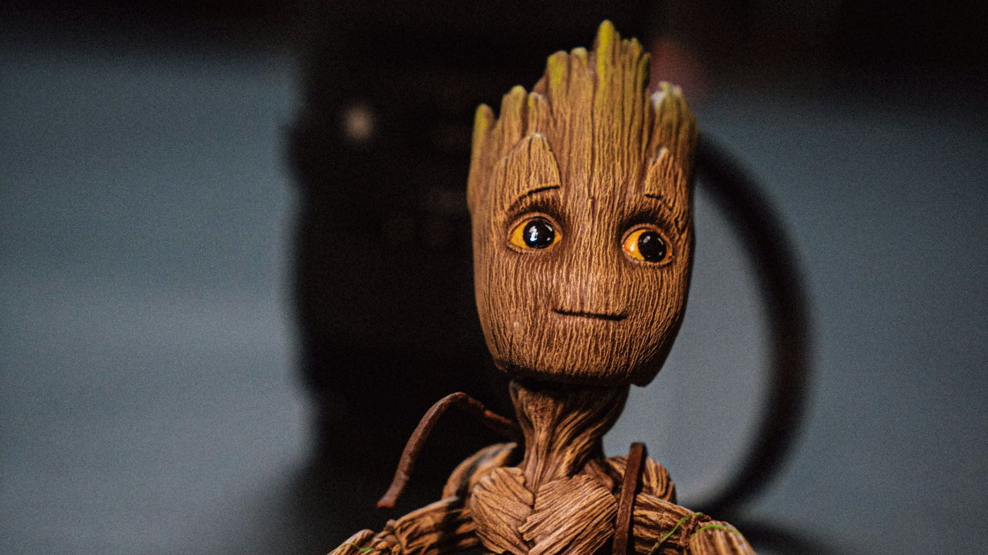 brown wooden animal figurine on black table