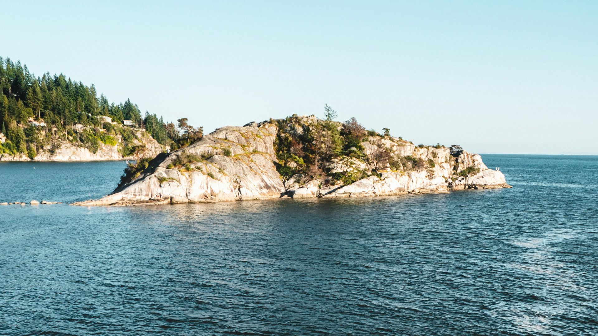 a small island in the middle of a body of water