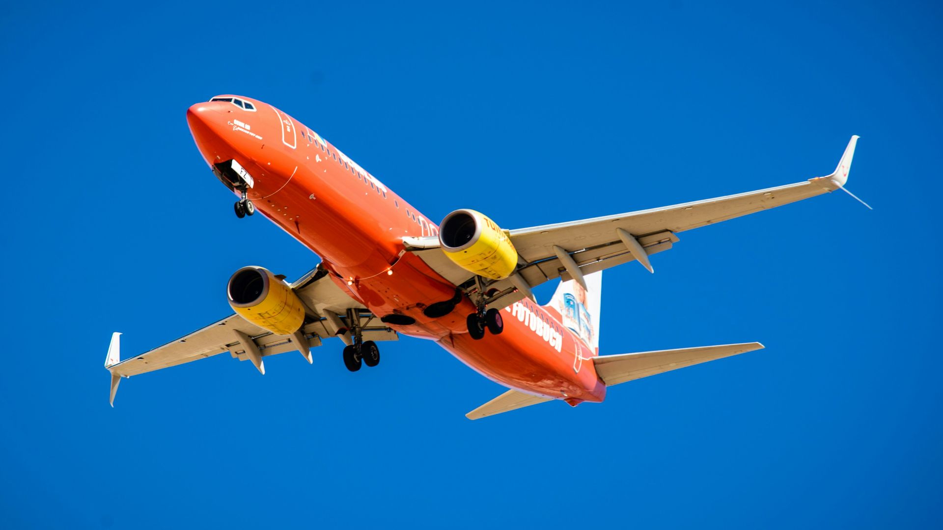 orange and white plane