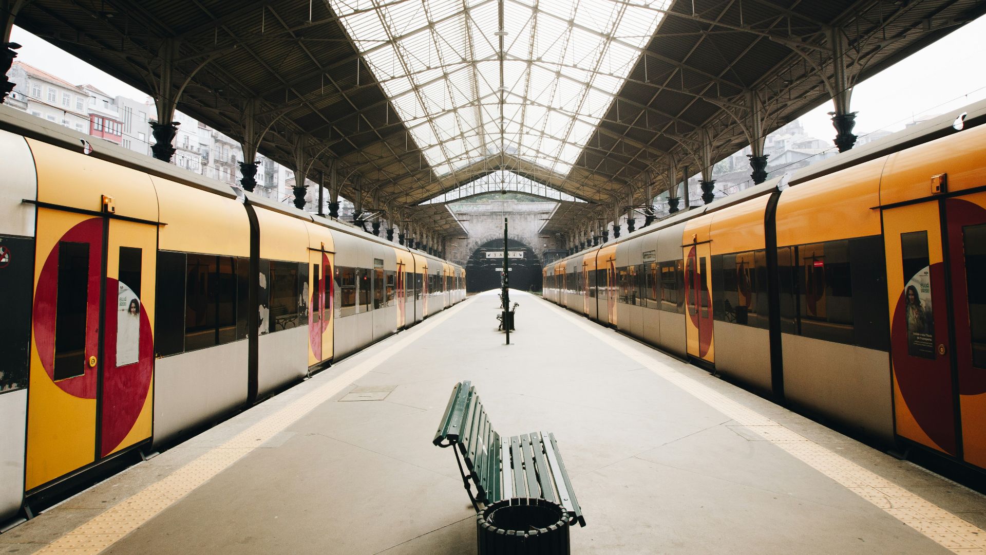green metal train station bench