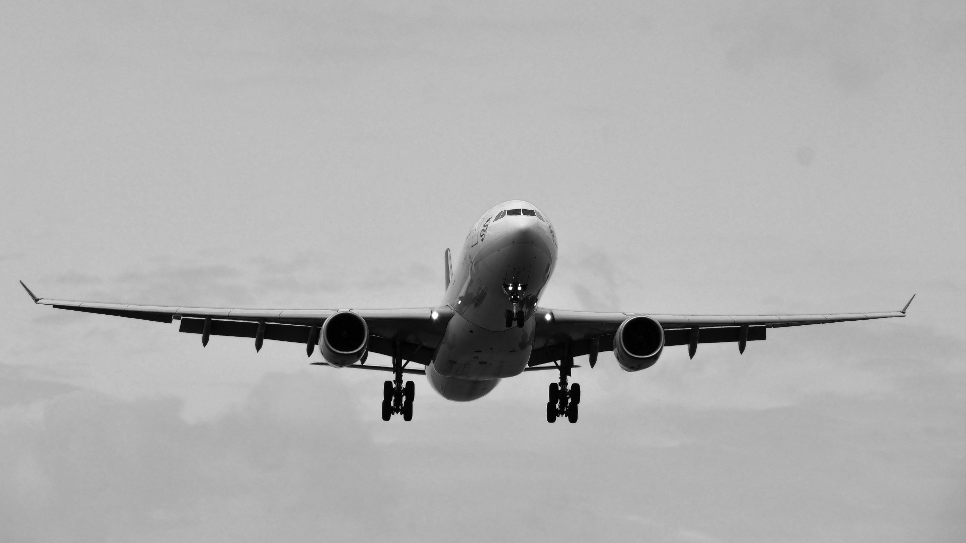 a large airplane flying in the sky