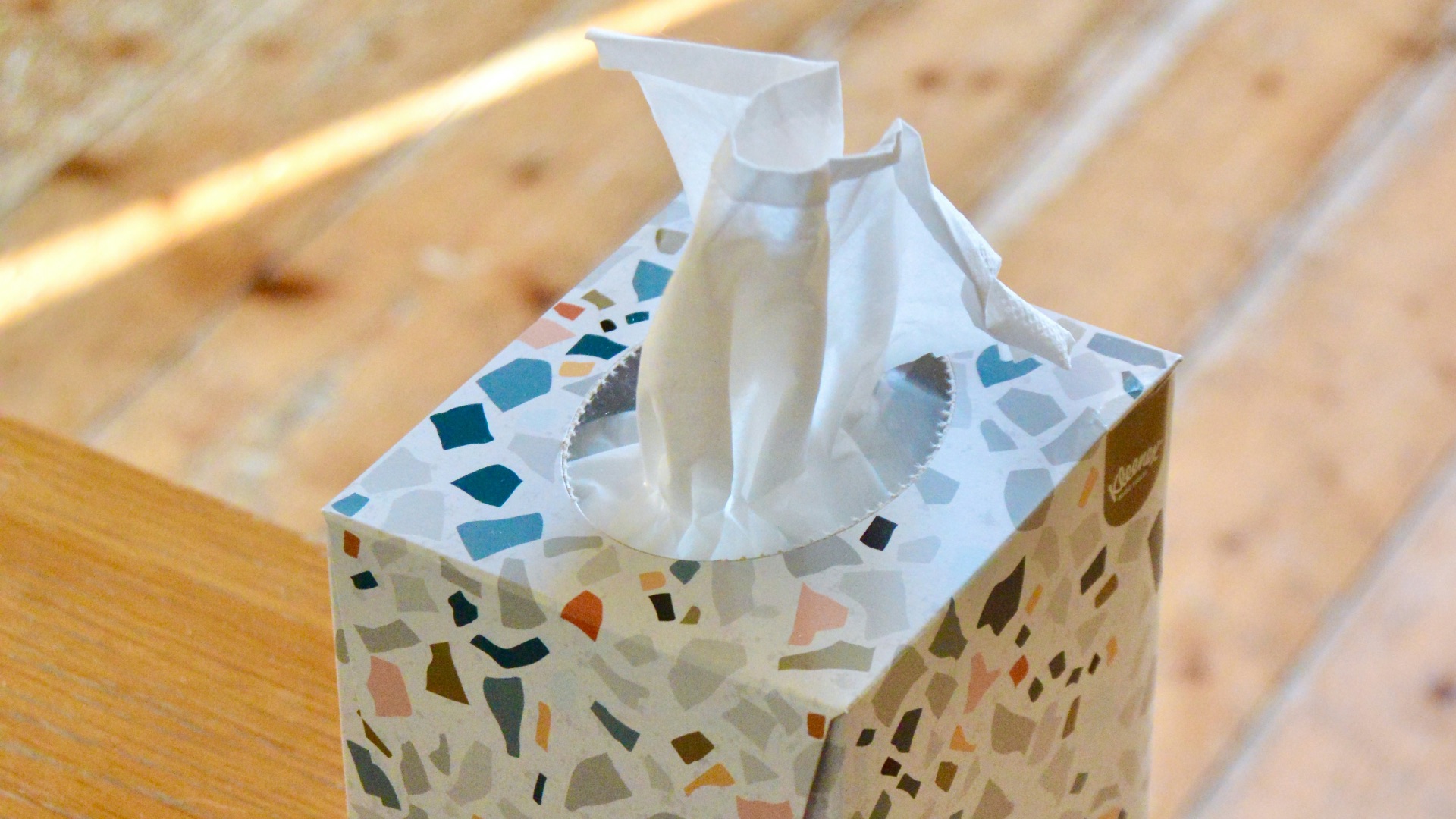 white and blue floral tissue box