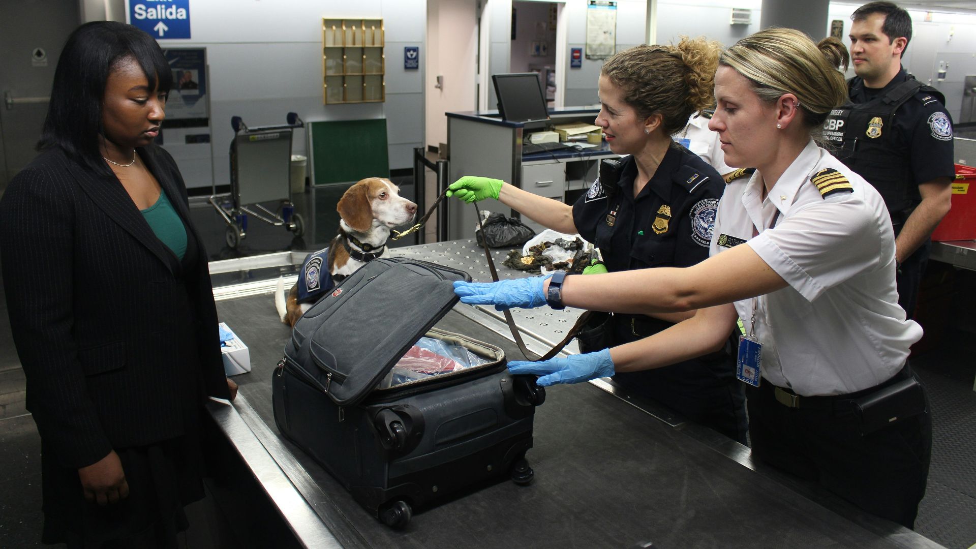 woman in black crew neck t-shirt standing beside woman in white t-shirt
