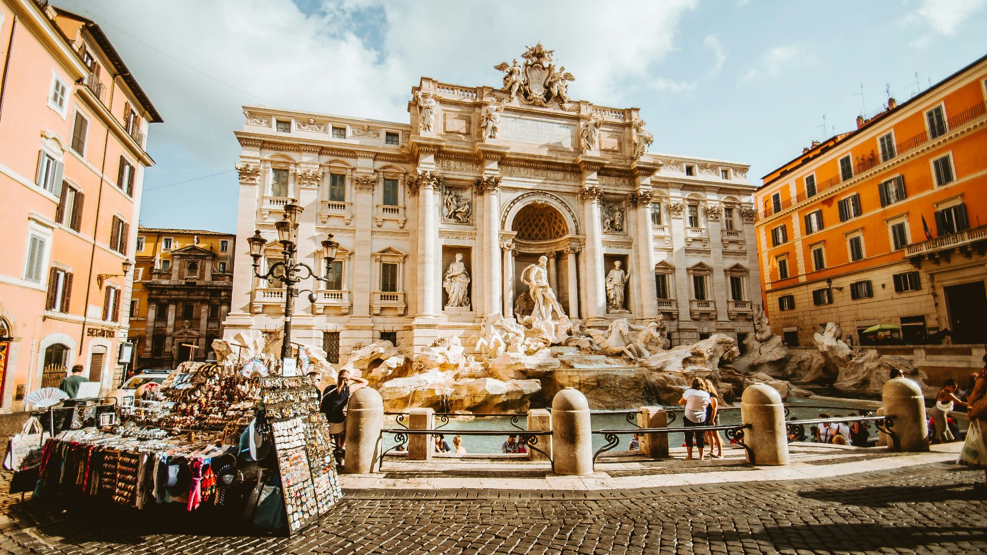 man standing in front of statue
