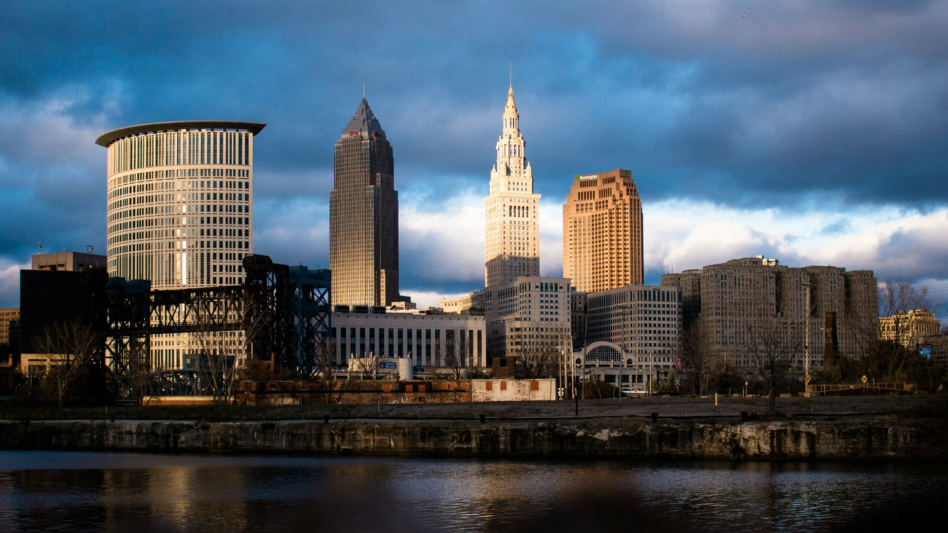 high rise buildings near body of water during daytime
