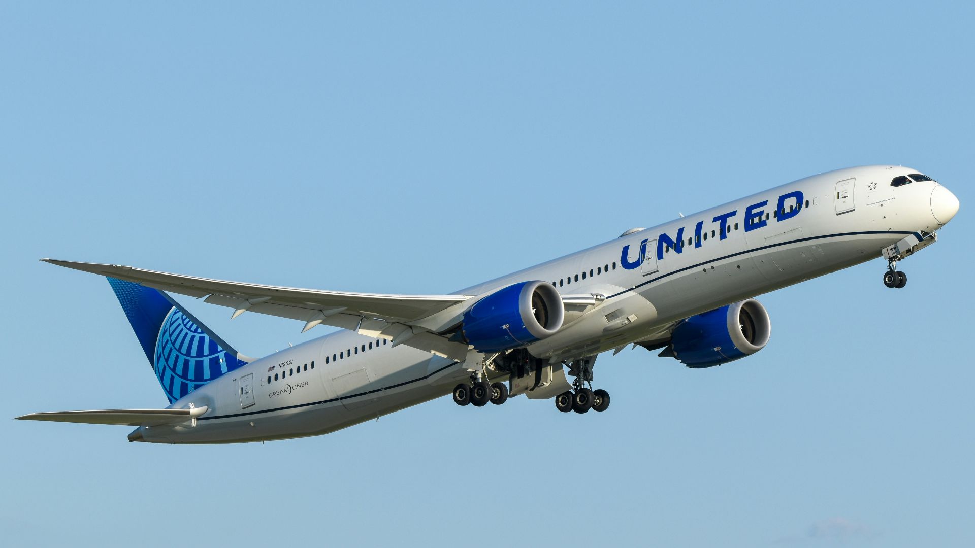 A united airlines plane flying in the sky