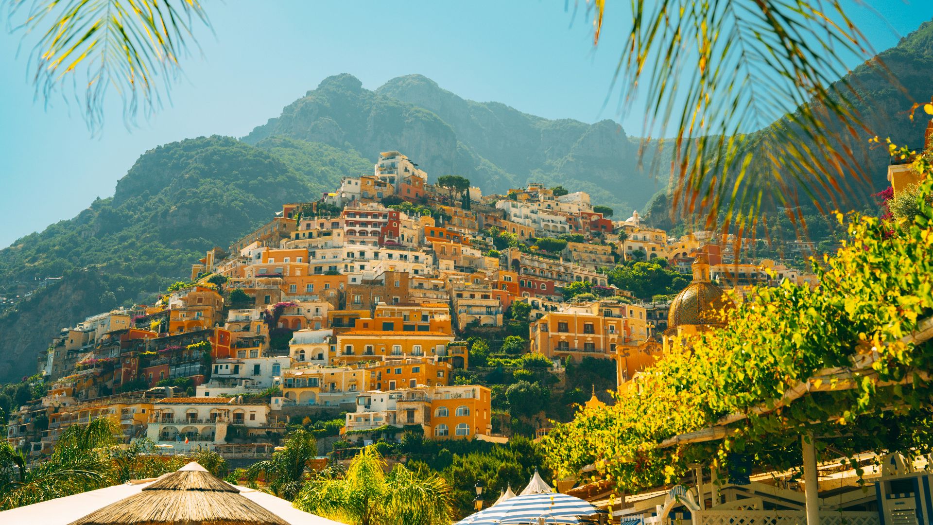 a view of a village on top of a mountain
