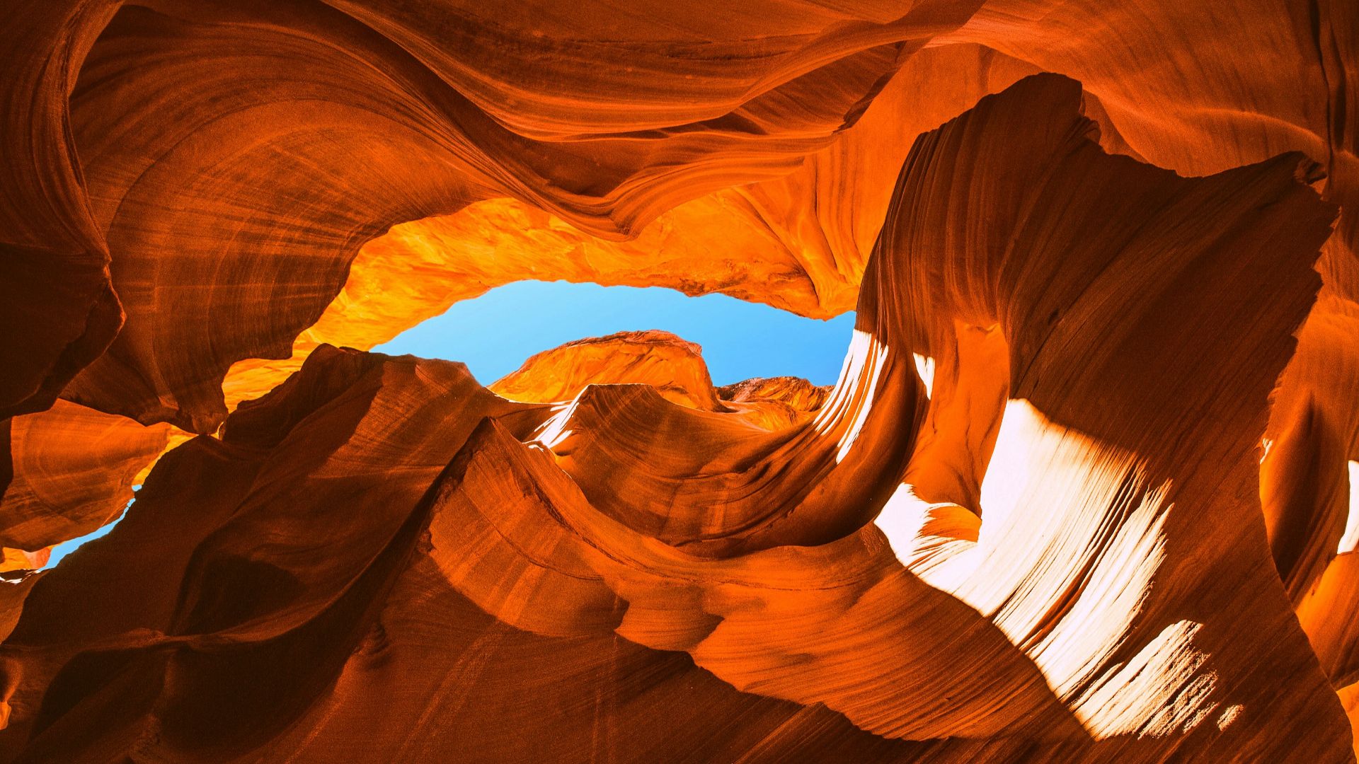 brown rock formation under blue sky during daytime