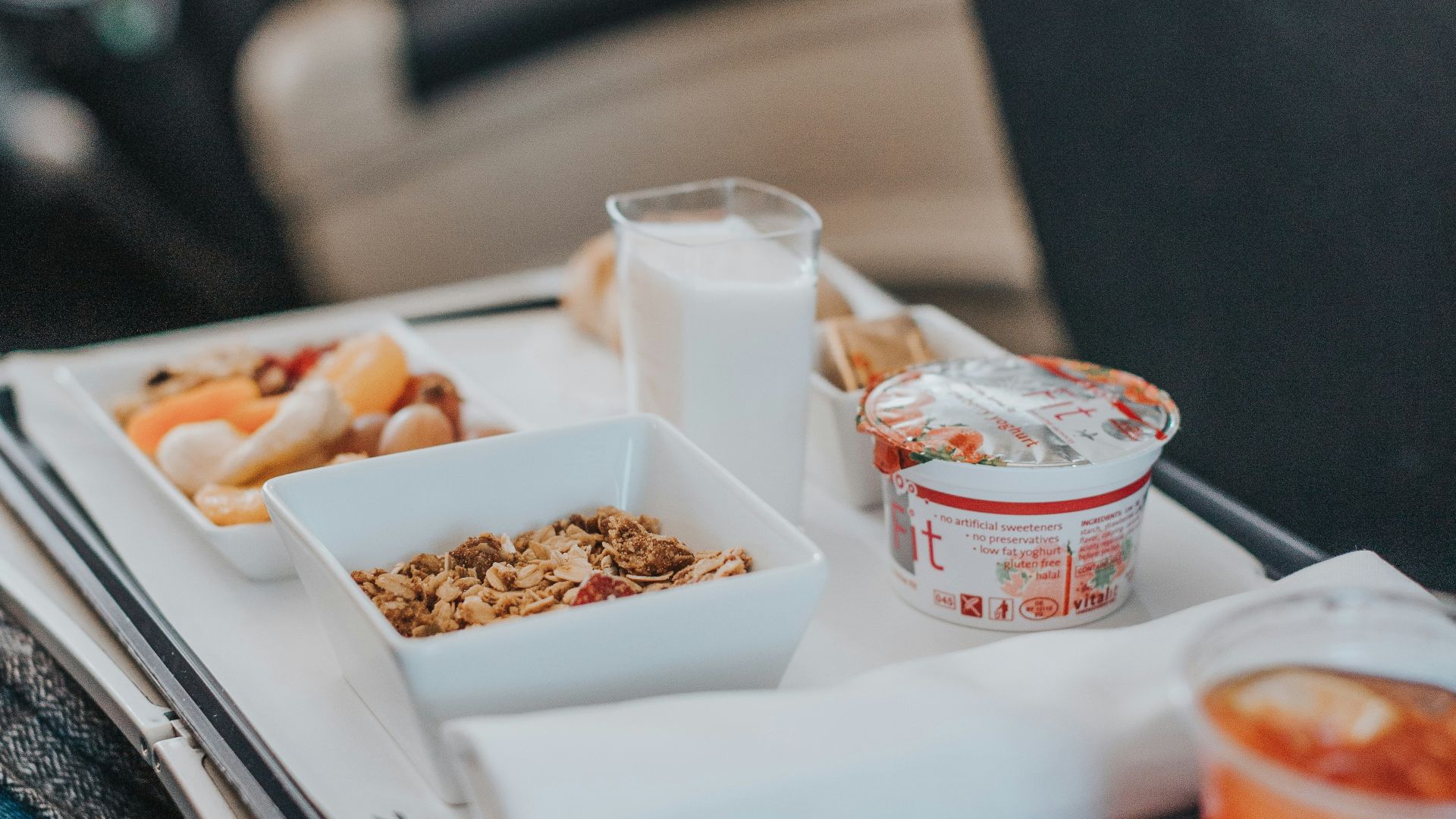 red liquid on cup beside bowl
