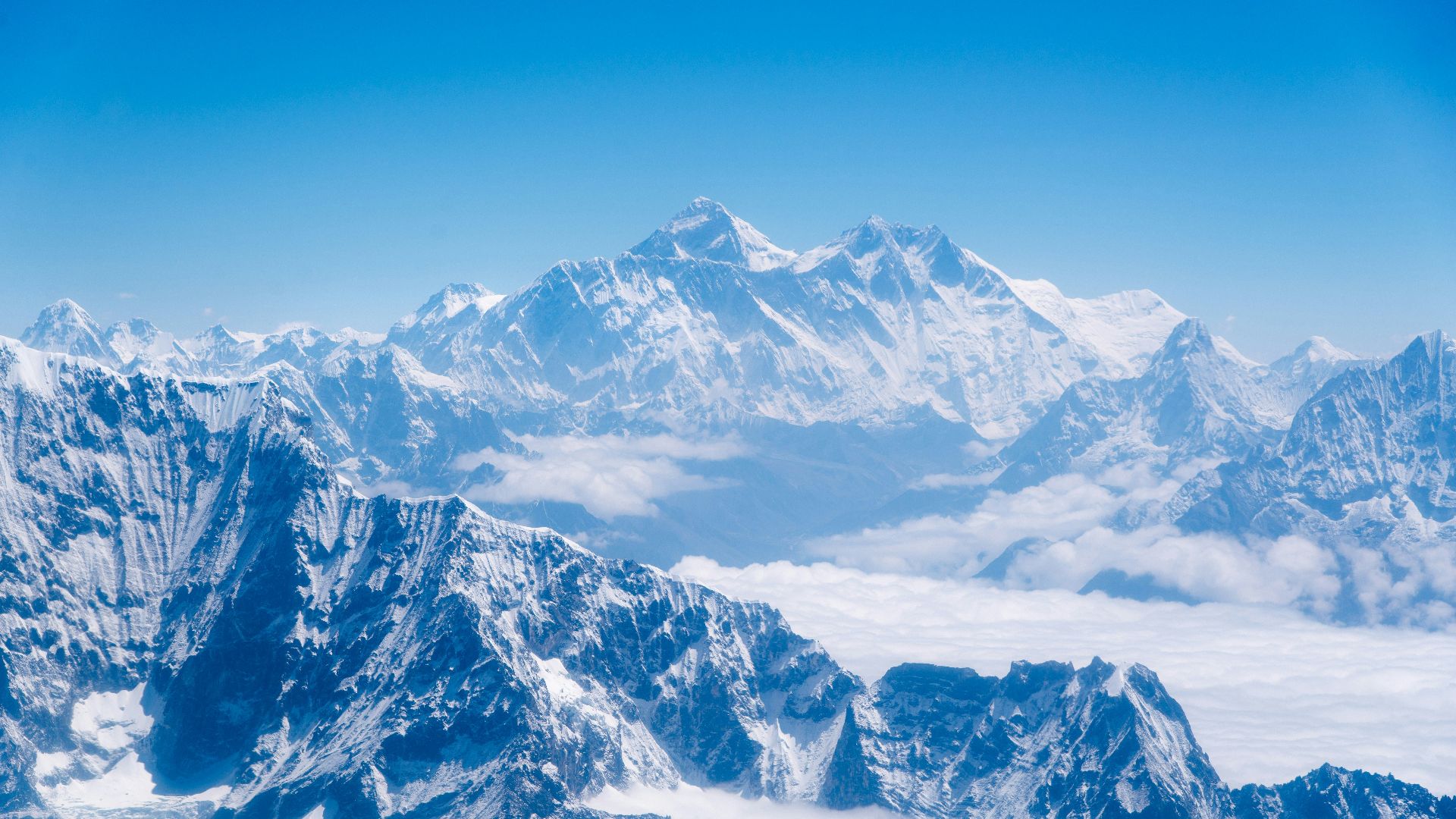 a view of a mountain range from an airplane