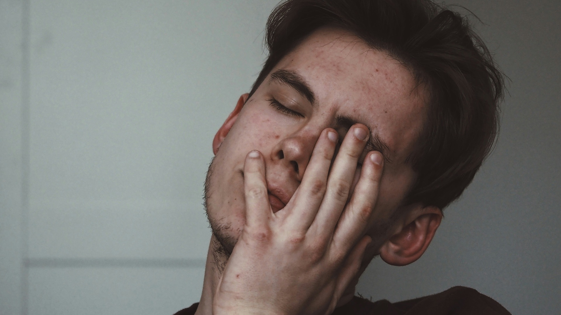man wearing black crew-neck top