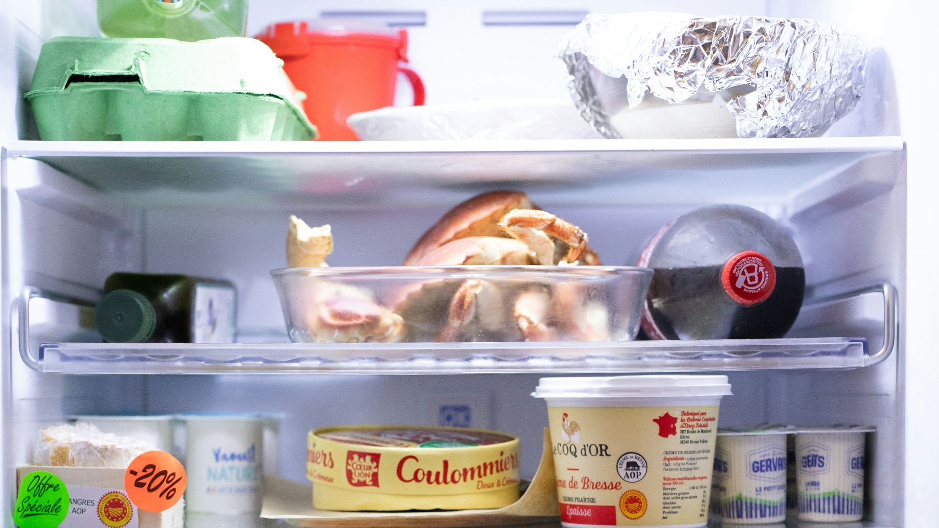 an open refrigerator filled with lots of food