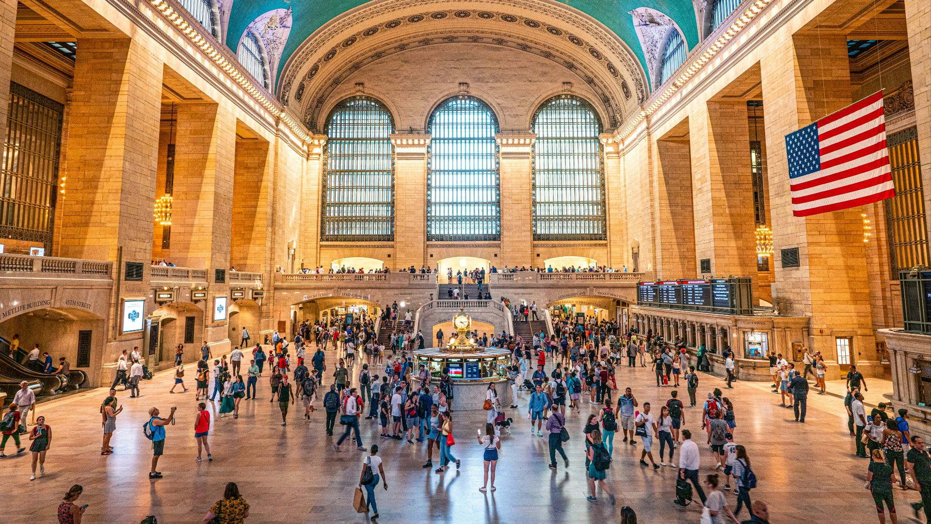 crowd of people walking in Grand Central Terminal