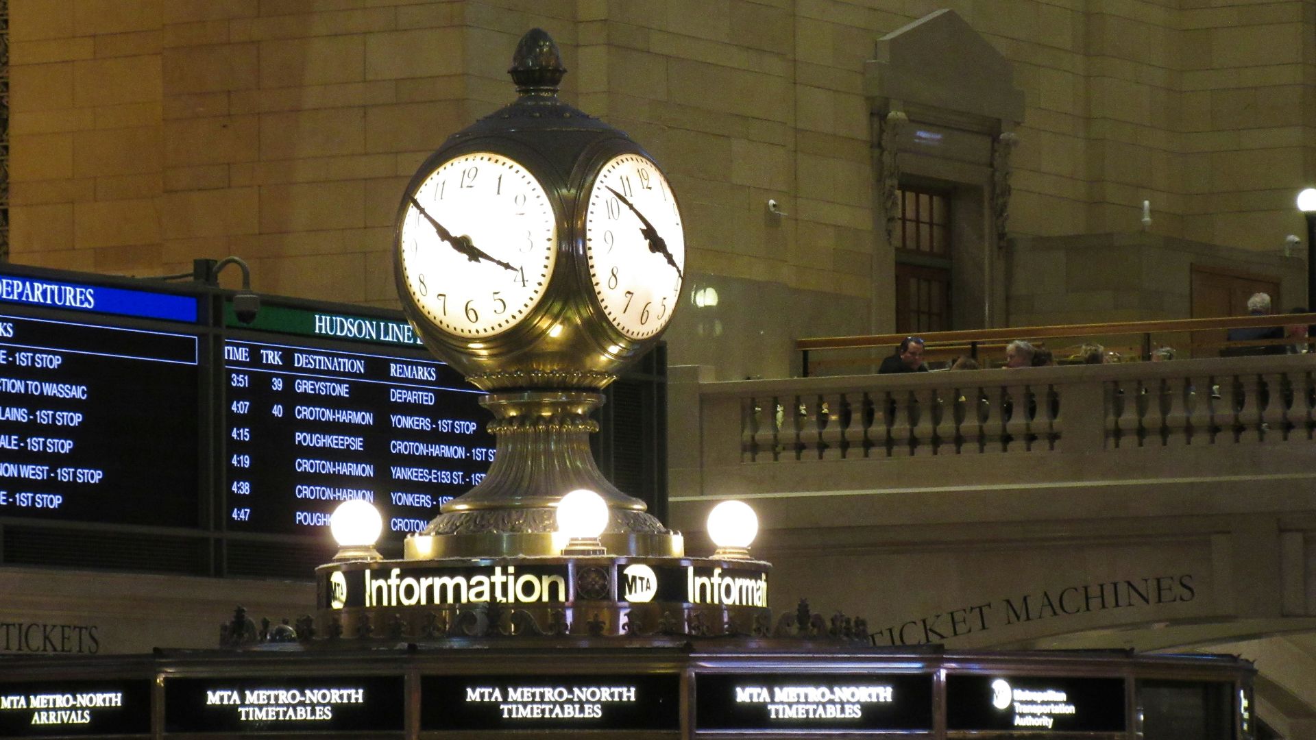 Grand central terminal clock with information signs
