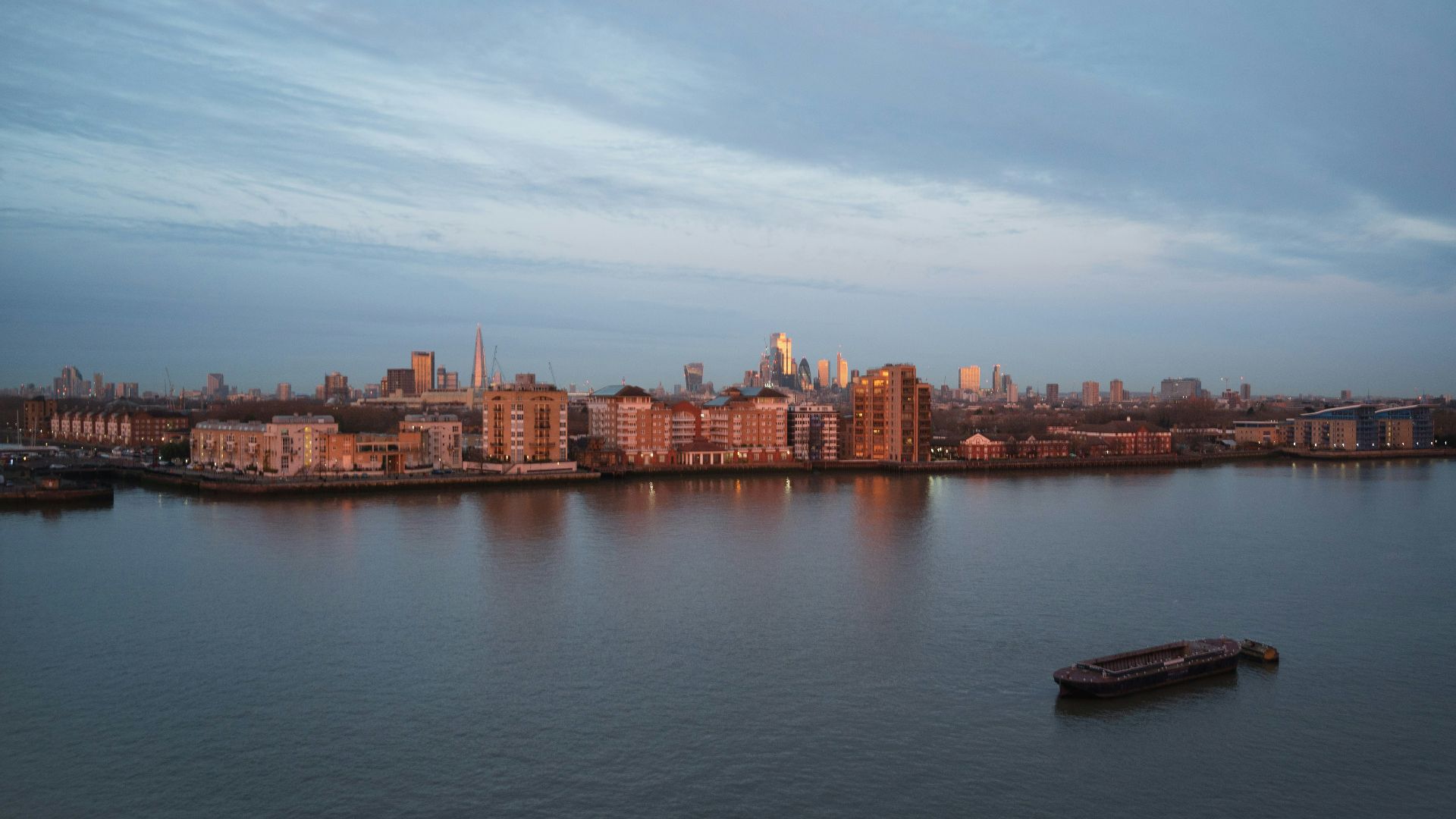 a boat floating on top of a large body of water