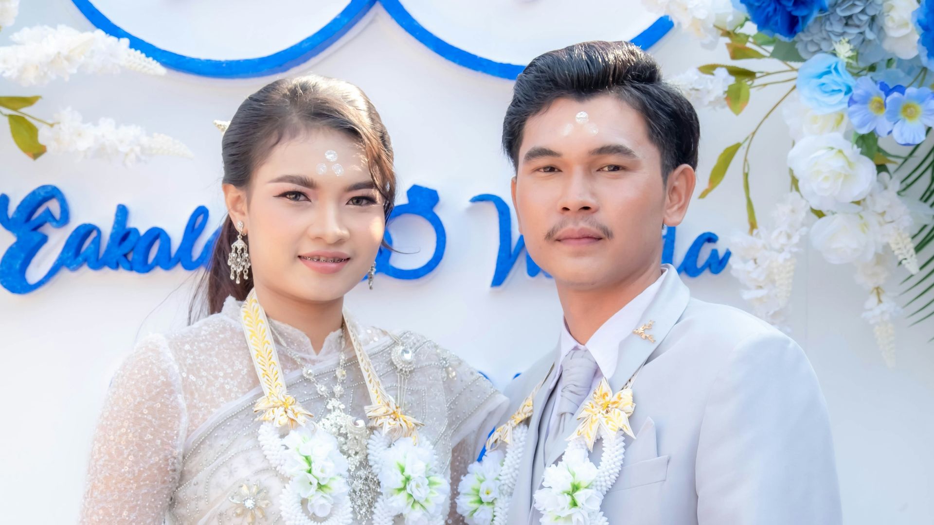 A man and a woman standing next to each other