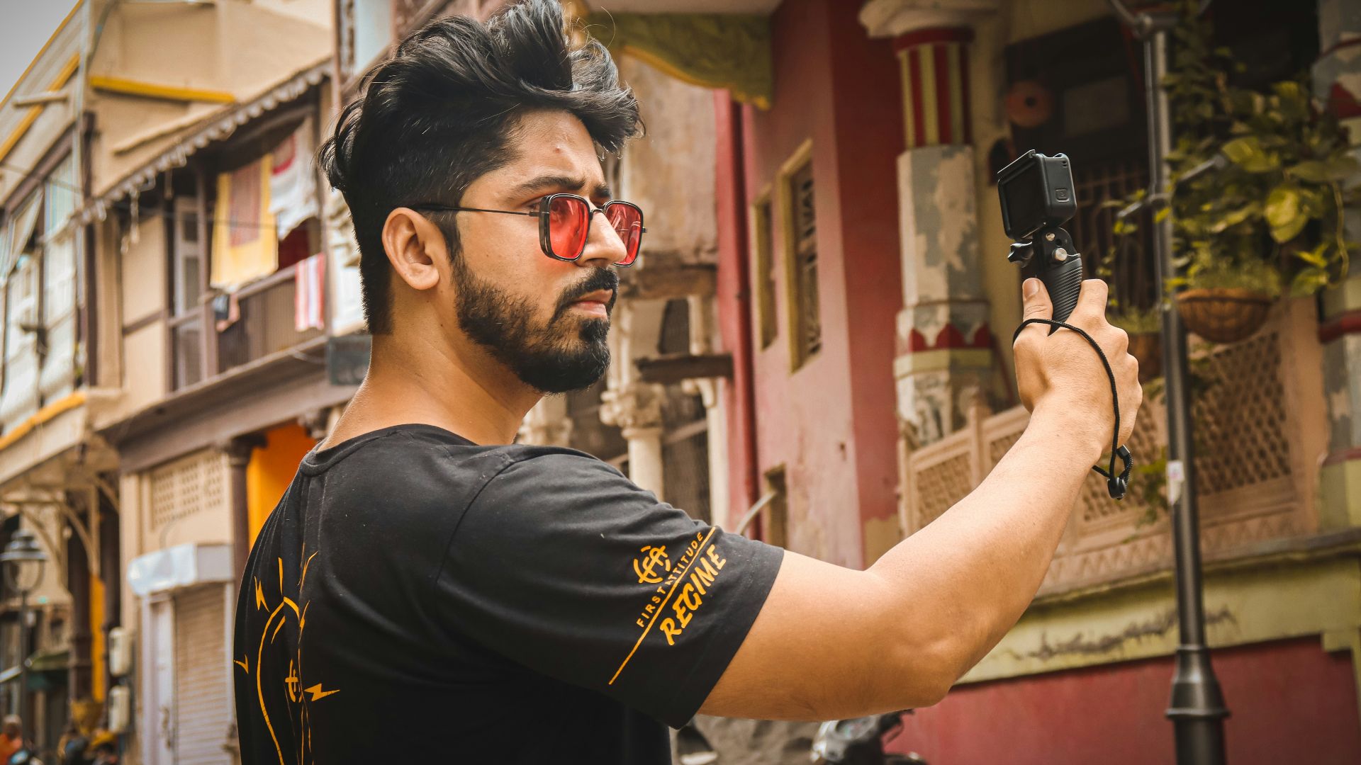 a man taking a picture of himself with a camera