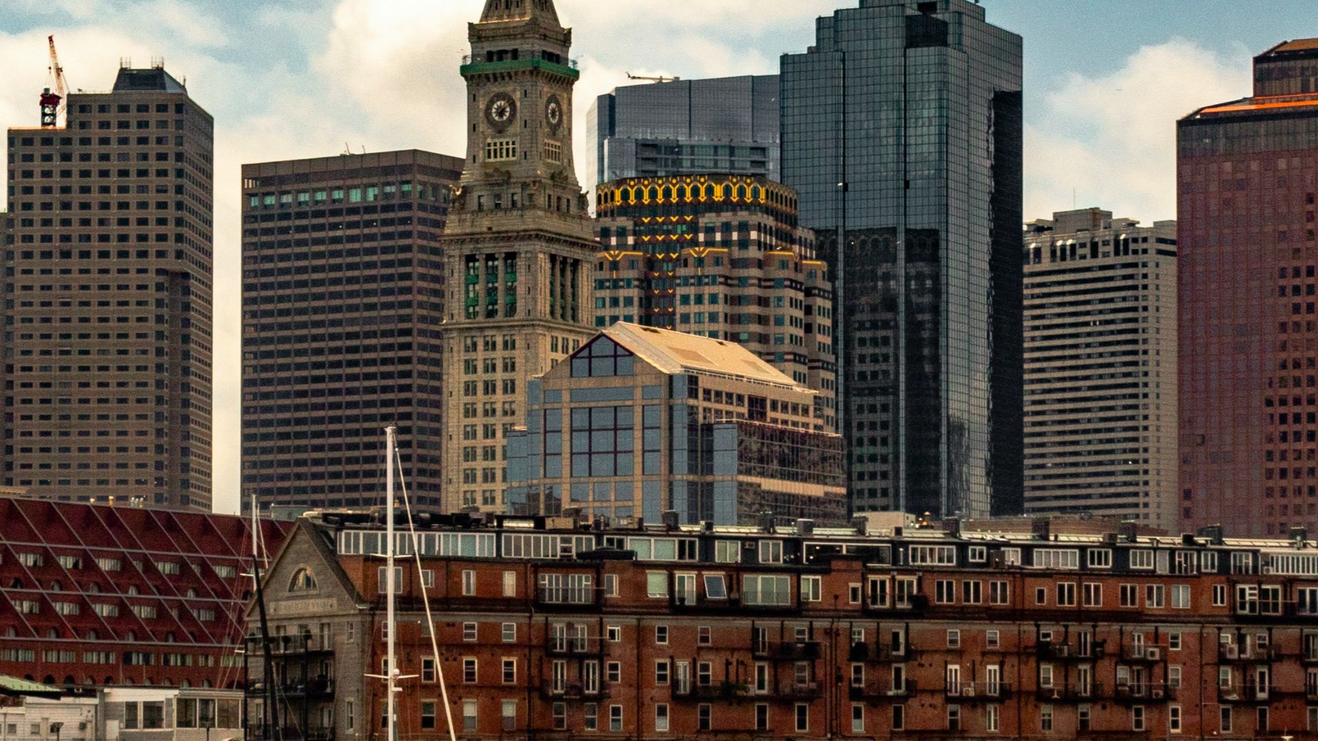 body of water near buildings at daytime