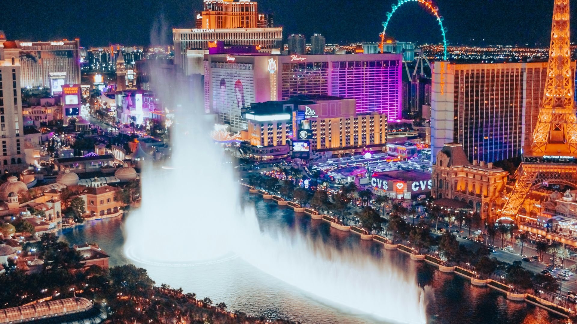 a city with a fountain in the middle of it
