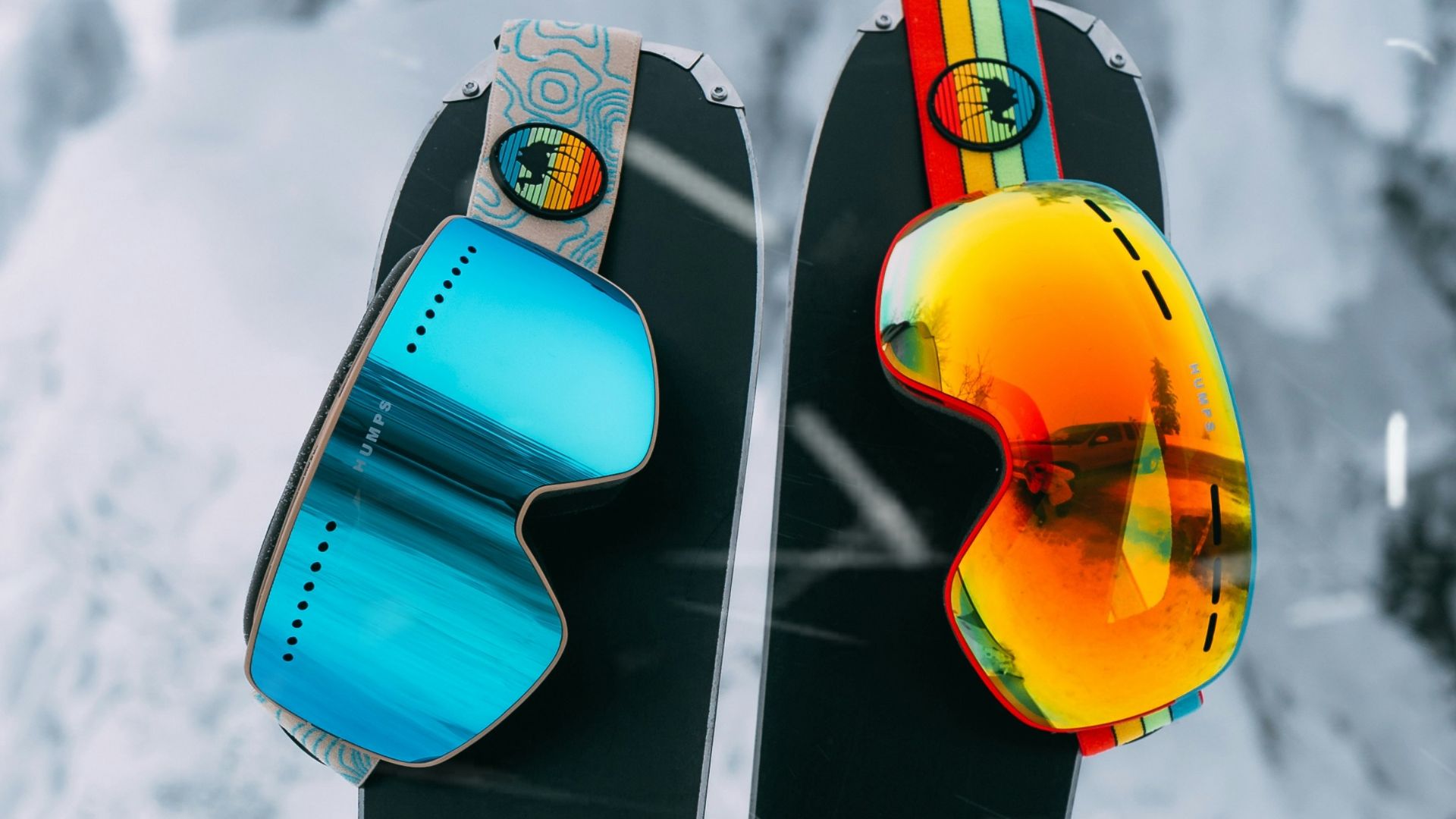 red and yellow snowboard on snow covered ground