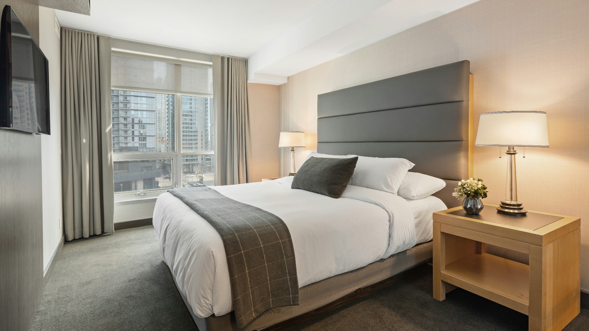 white bed linen on bed