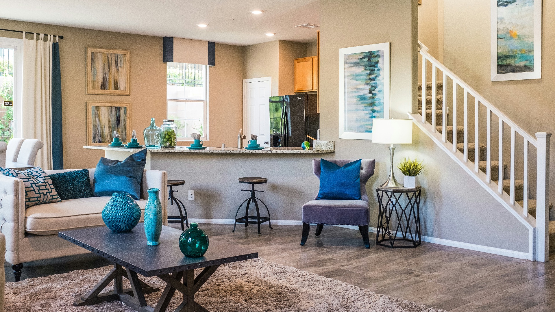 black wooden table on rug