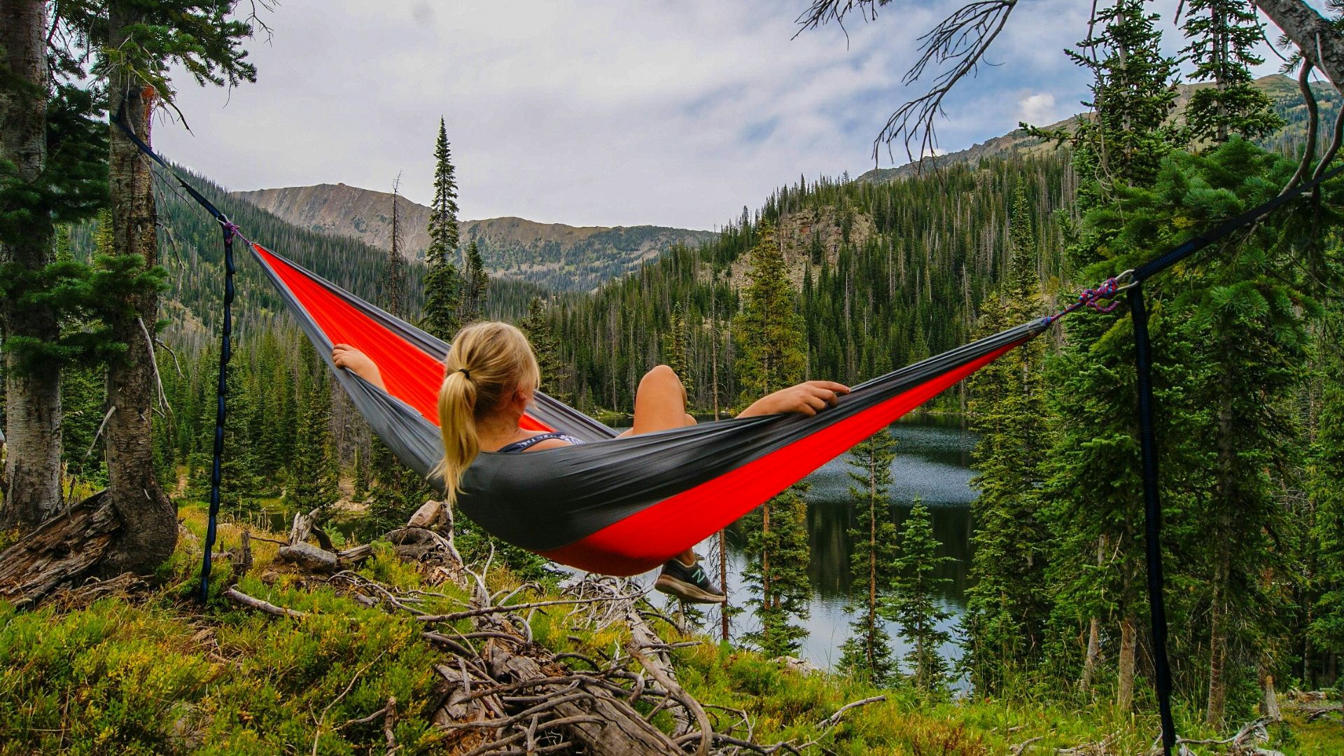 woman on hammock near to river