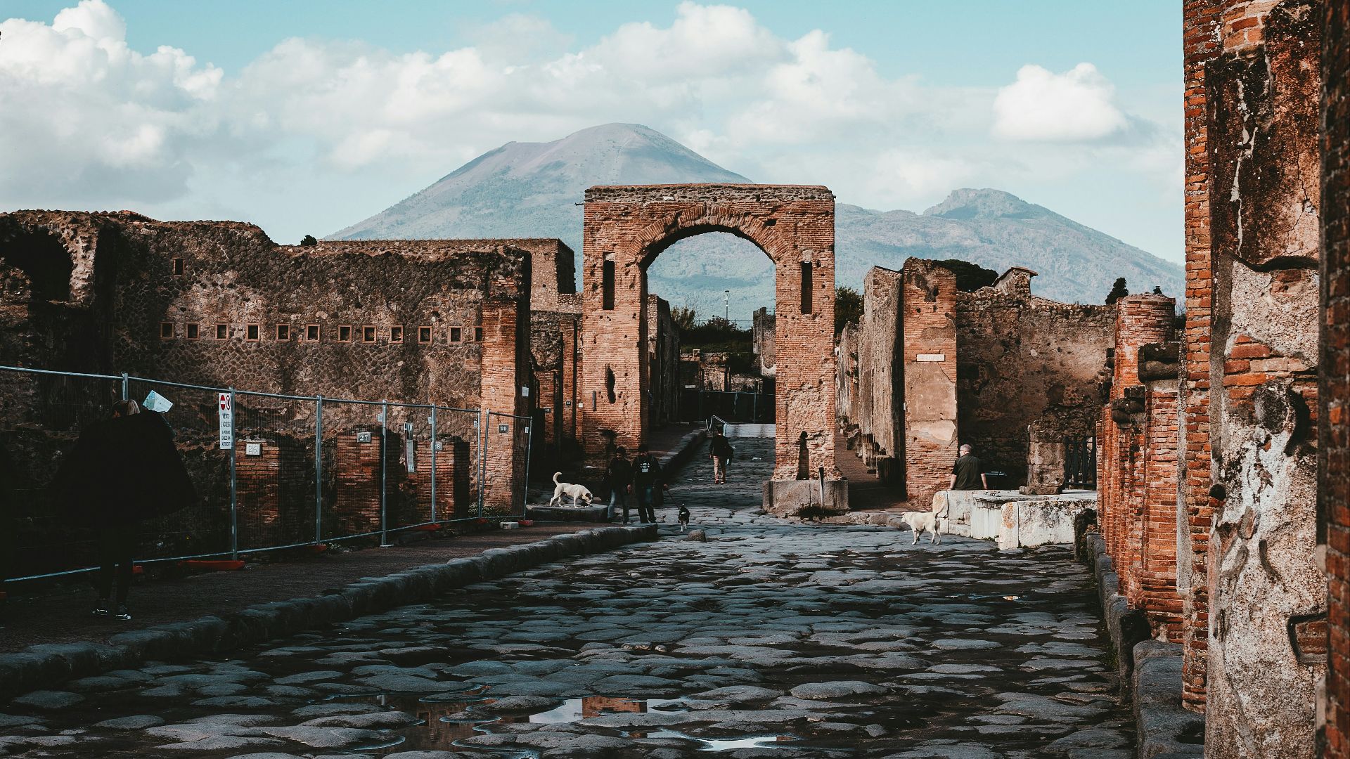 brown village arch during daytime